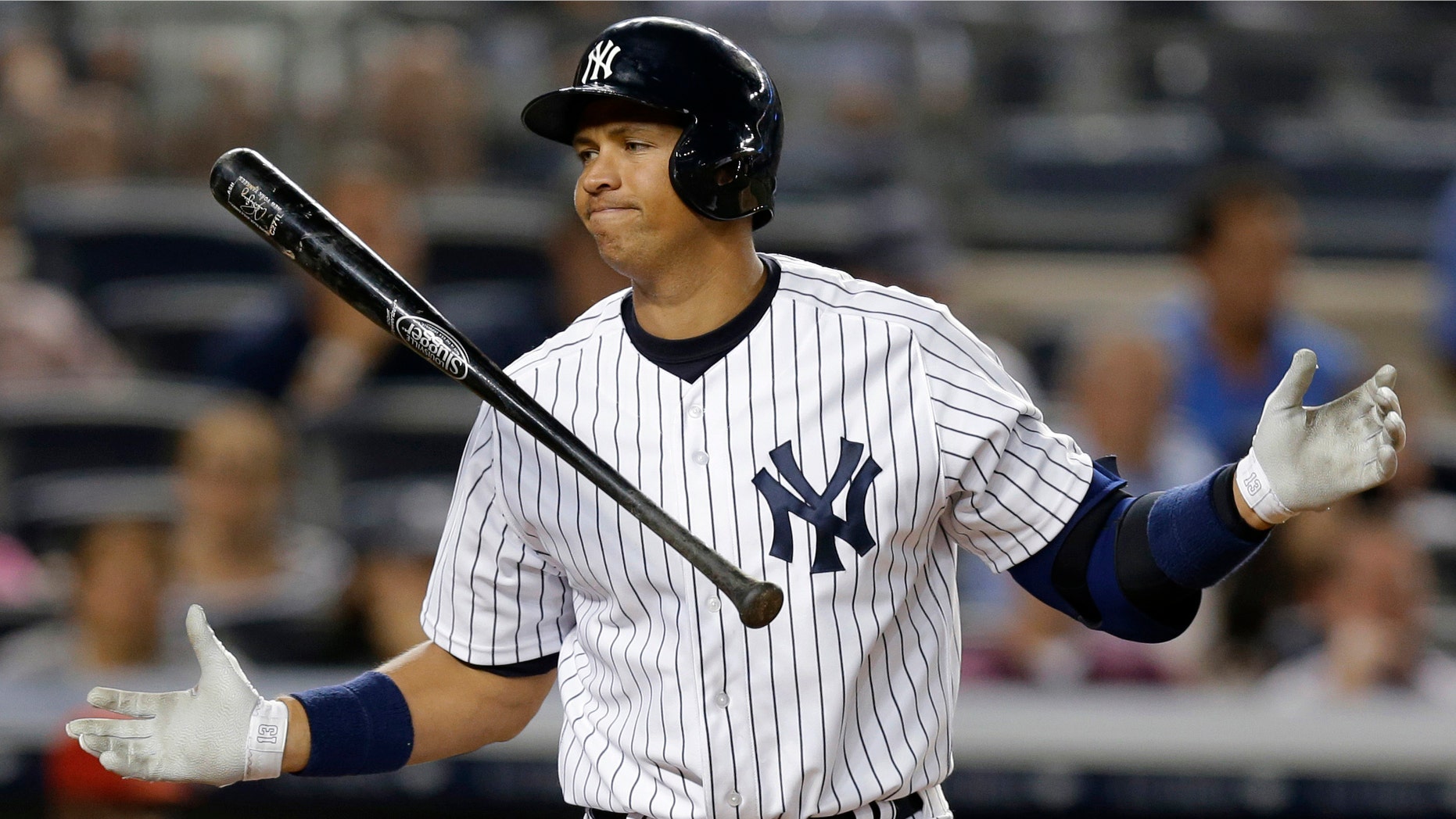 FILE - In this Aug. 13, 2013 file photo, New York Yankees' Alex Rodriguez reacts after striking out in the seventh inning of a baseball game against the Los Angeles Angels in New York. Rodriguezâs drug suspension has been reduced to 162 games, potentially sidelining the slugger for the entire 2014 season. The New York Yankees third baseman was suspended for 211 games on Aug. 5 by baseball Commissioner Bud Selig. The penalty was given for alleged violations of the sport's drug agreement and labor contract and followed Major League Baseball's investigation of the Biogenesis of America anti-aging clinic, which was accused of distributing banned performance-enhancing drugs. (AP Photo/Kathy Willens, File)
