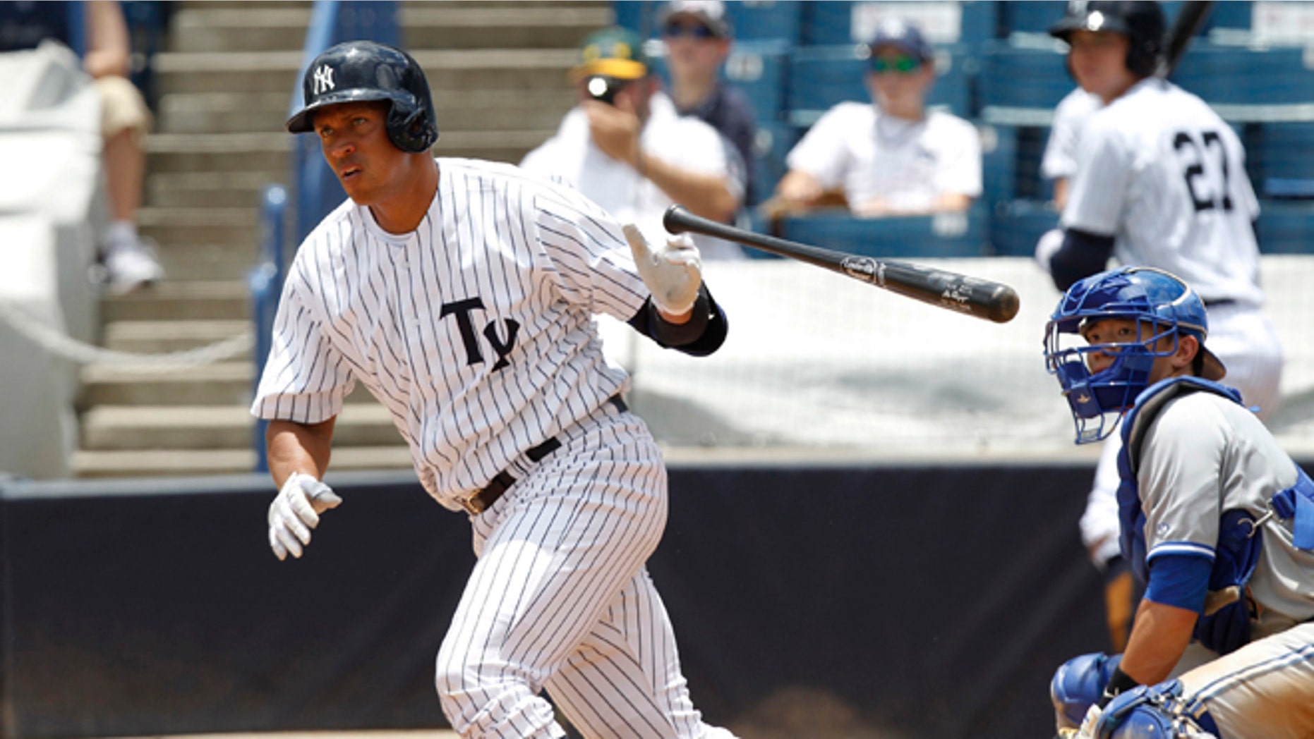 New York Yankees' Alex Rodriquez drops the bat as he heads for first with a single in the sixth inning for the Tampa Yankees against the Dunedin Blue Jays in a minor league baseball rehab game in Tampa, Fla., Wednesday, July 10, 2013. (AP Photo/Scott Iskowitz)
