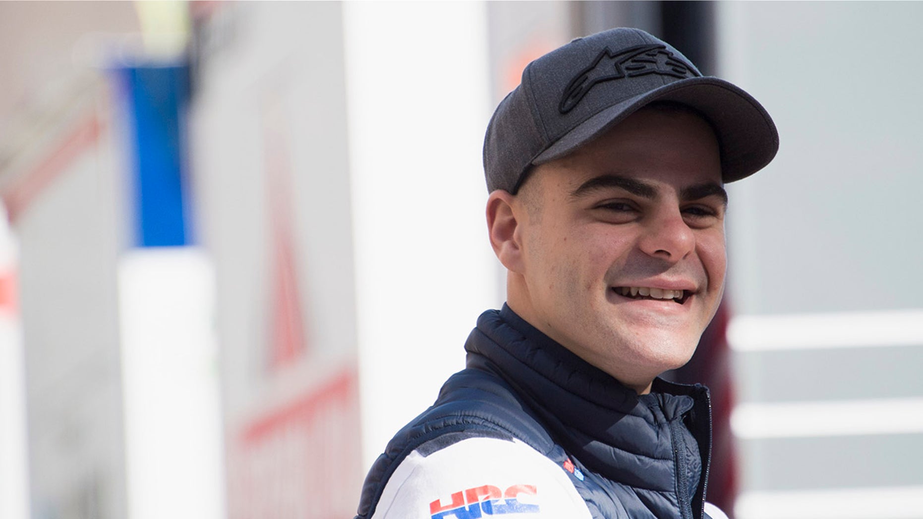 Romano Fenati has been let go by his team over his 'unsporting, dangerous and damaging conduct' during a race Sunday.