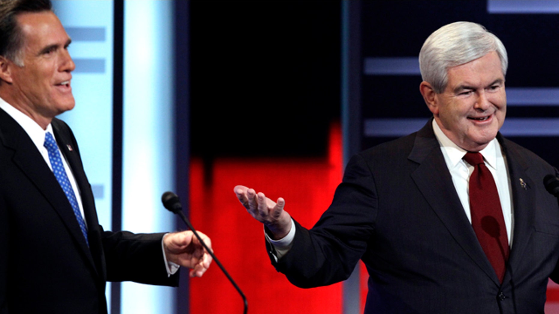 Dec. 10: Mitt Romney, left, and Newt Gingrich, square off in GOP debate.