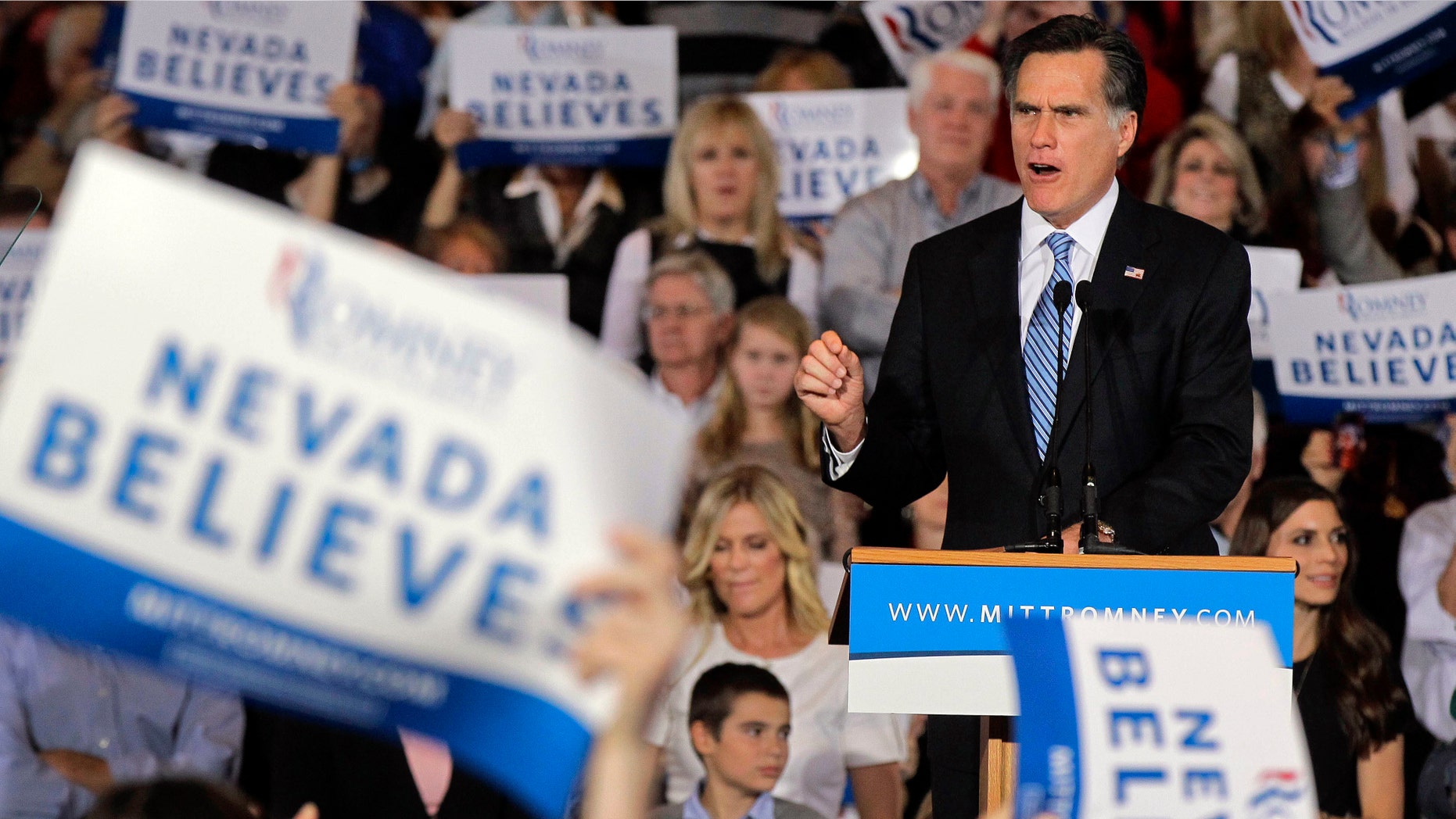 Republican presidential candidate former Massachusetts Gov. Mitt Romney speaks to supporters at his Nevada caucus night victory celebration in Las Vegas, Saturday, Feb. 4, 2012. (AP Photo/Julie Jacobson)
