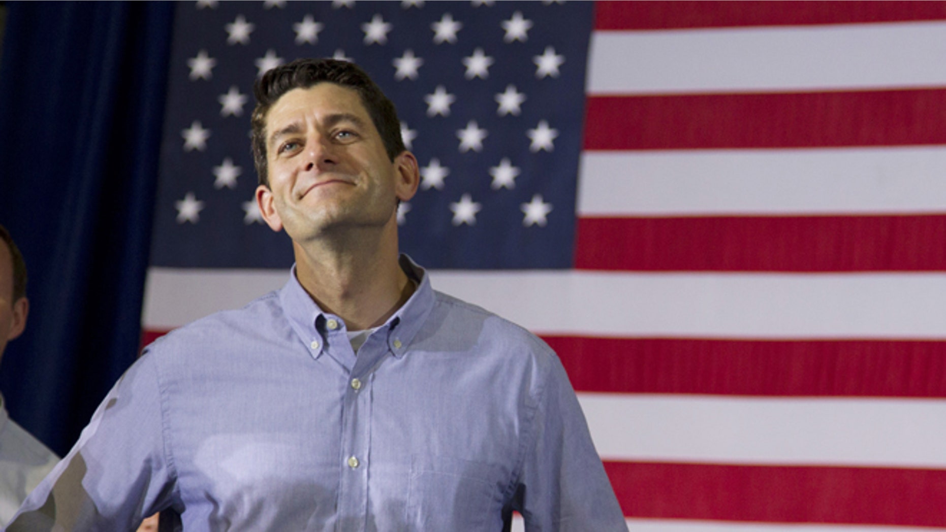June 18, 2012: Rep. Paul Ryan, R-Wis., looks on during a campaign event with Republican presidential candidate, former Massachusetts Gov. Mitt Romney at Monterey Mills in Janesville, Wis.