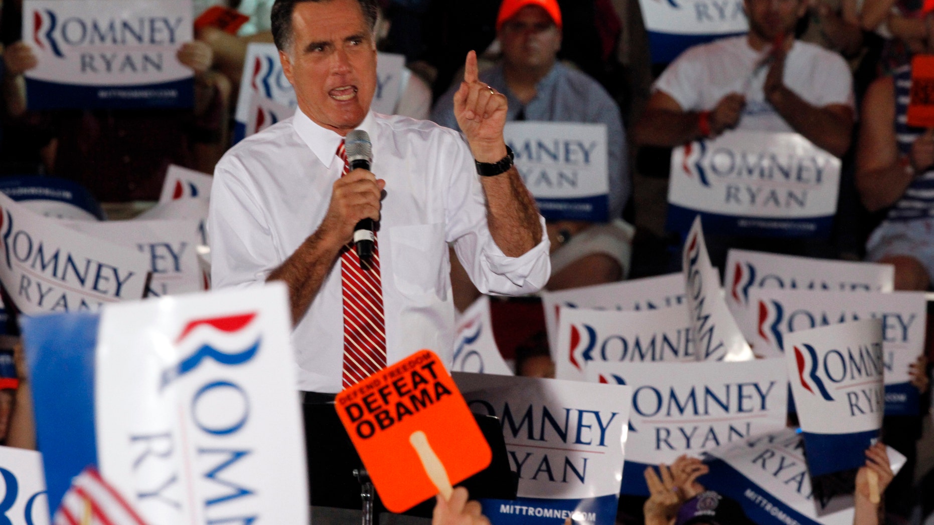 Republican presidential candidate Mitt Romney, gestures during a rally in Fishersville, Va., Thursday, Oct. 4, 2012.(AP Photo/Steve Helber)
