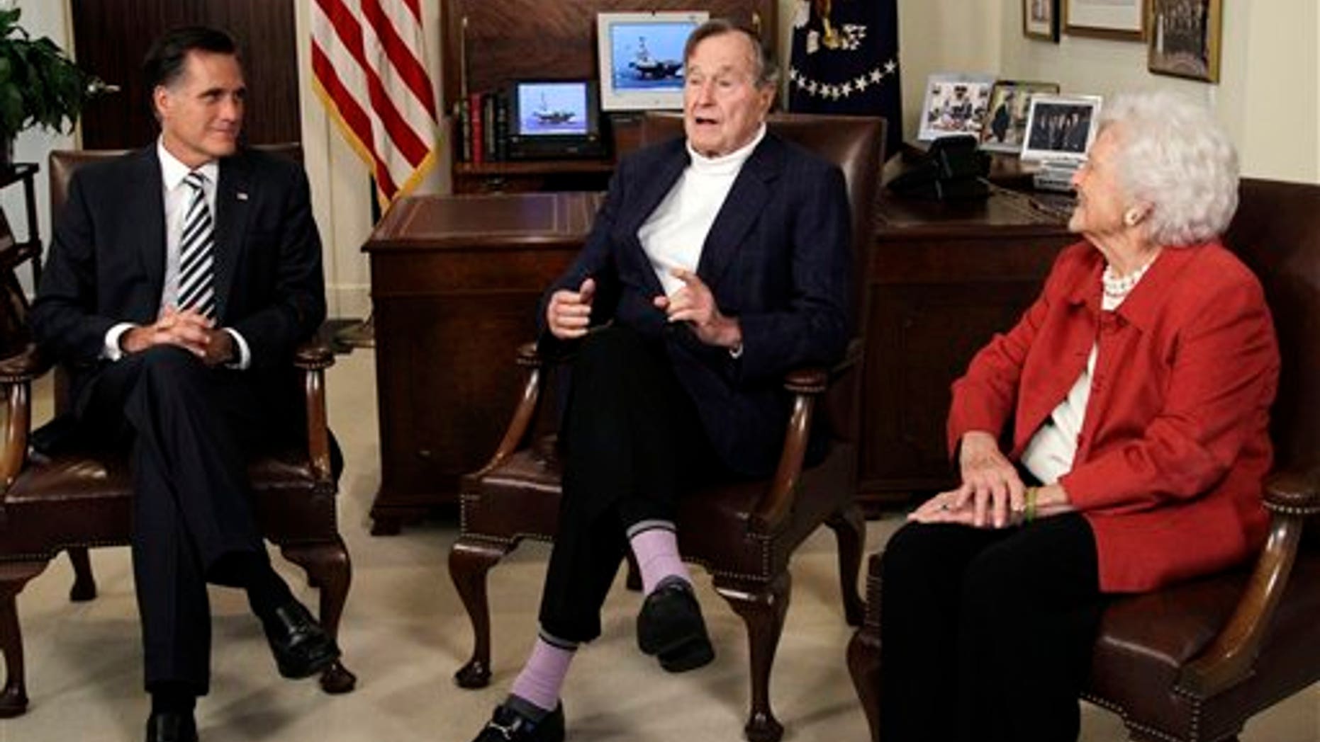 March 29: Republican presidential candidate and former Massachusetts Gov. Mitt Romney, left, meets with former President George H.W. Bush and Barbara Bush to receive their endorsements in Houston.