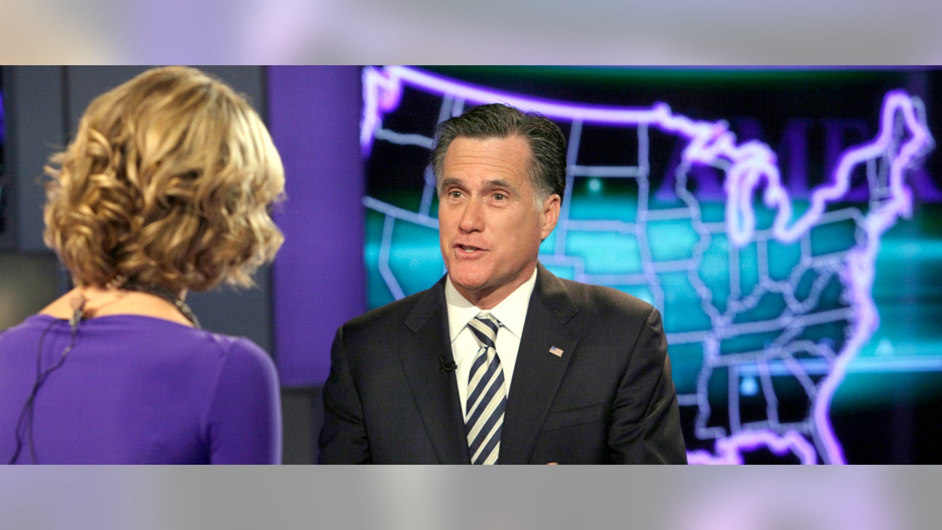 Republican presidential candidate, former Massachusetts Gov. Mitt Romney is interviewed by Megyn Kelly during a segment of "America Live" on the Fox News Channel, in New York, Wednesday, March 14, 2012. (AP Photo/Richard Drew)