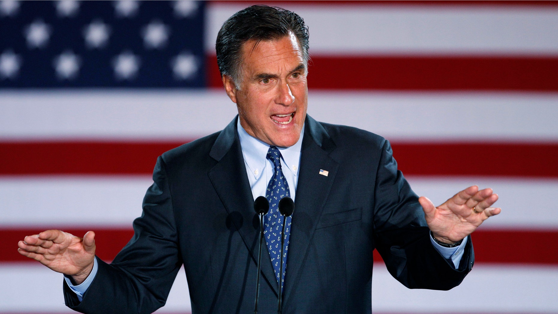 Republican presidential candidate former Massachusetts Gov. Mitt Romney declares victory in the Wisconsin presidential primary, Tuesday, April 3, 2012, at the Grain Exchange in Milwaukee. (AP Photo/M. Spencer Green)