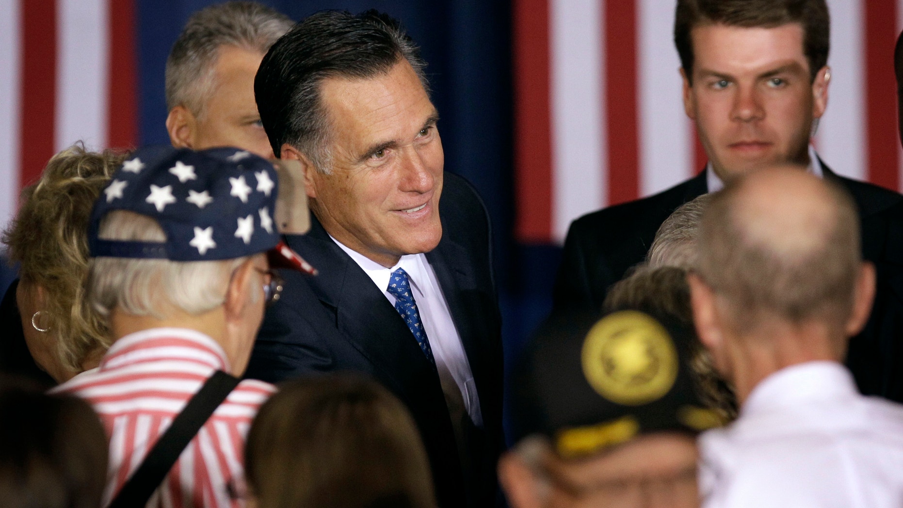 May 15, 2012: Republican presidential candidate, former Massachusetts Gov. Mitt Romney greets supporters after speaking at a campaign stop.