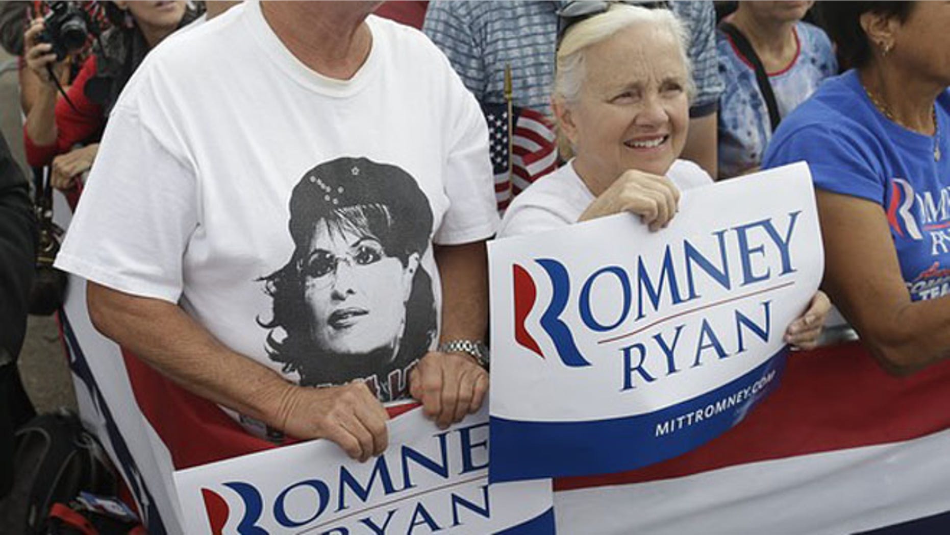 FILE: Sept. 24, 2012: The image of Sarah Palin is seen on a T-shirt as Mitt Romney campaigns in Pueblo, Colo.