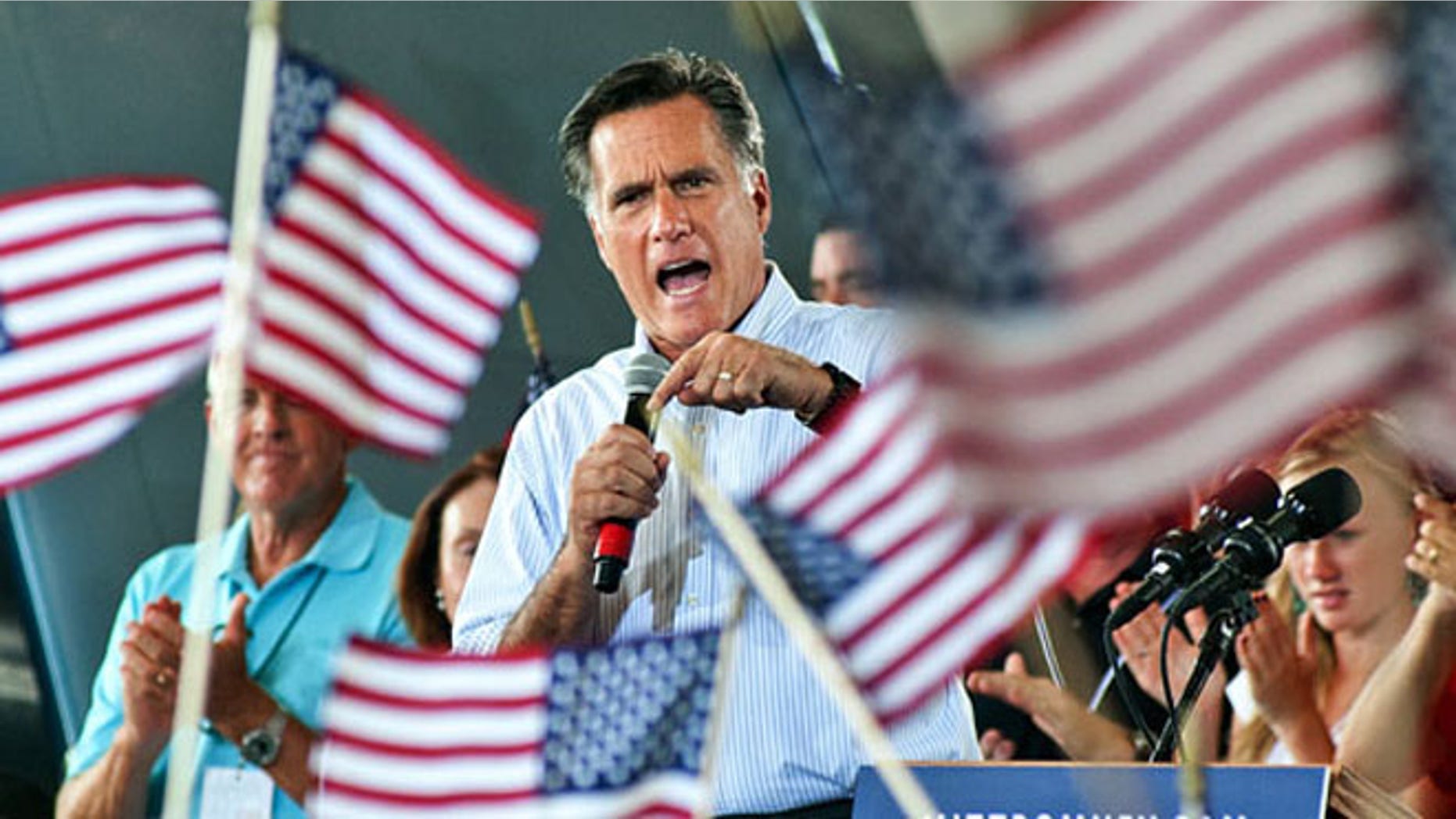 Mitt Romney speaks at a rally.