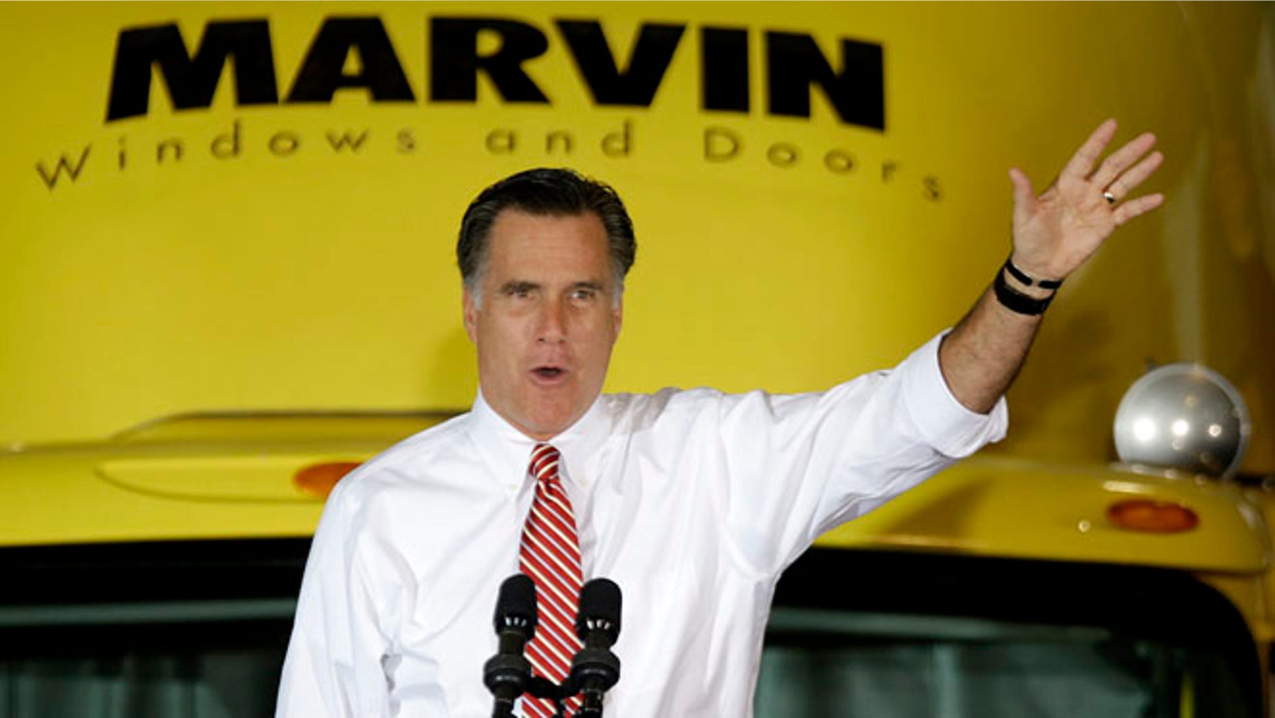 Thursday, Nov. 1, 2012: Mitt Romney gestures as he speaks at a campaign event at Integrity Windows in Roanoke, Va.