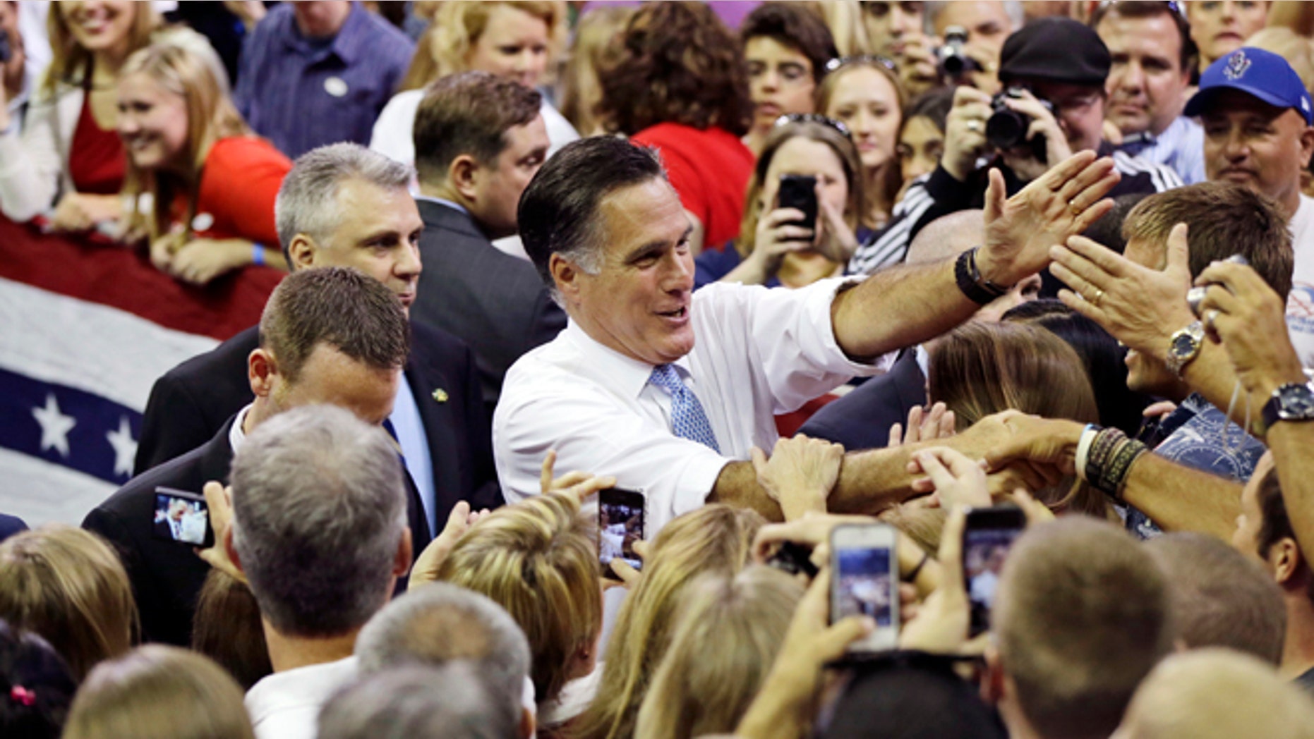 Saturday, Oct. 27, 2012: Mitt Romney greets supporters as he campaigns at the Pensacola Civic Center in Pensacola, Fla.