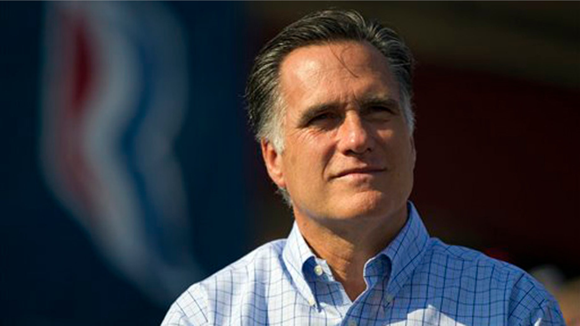 Aug. 25, 2012: Mitt Romney listens as vice presidential running mate Rep. Paul Ryan, R-Wis., not pictured, speaks during a campaign rally in Powell, Ohio.