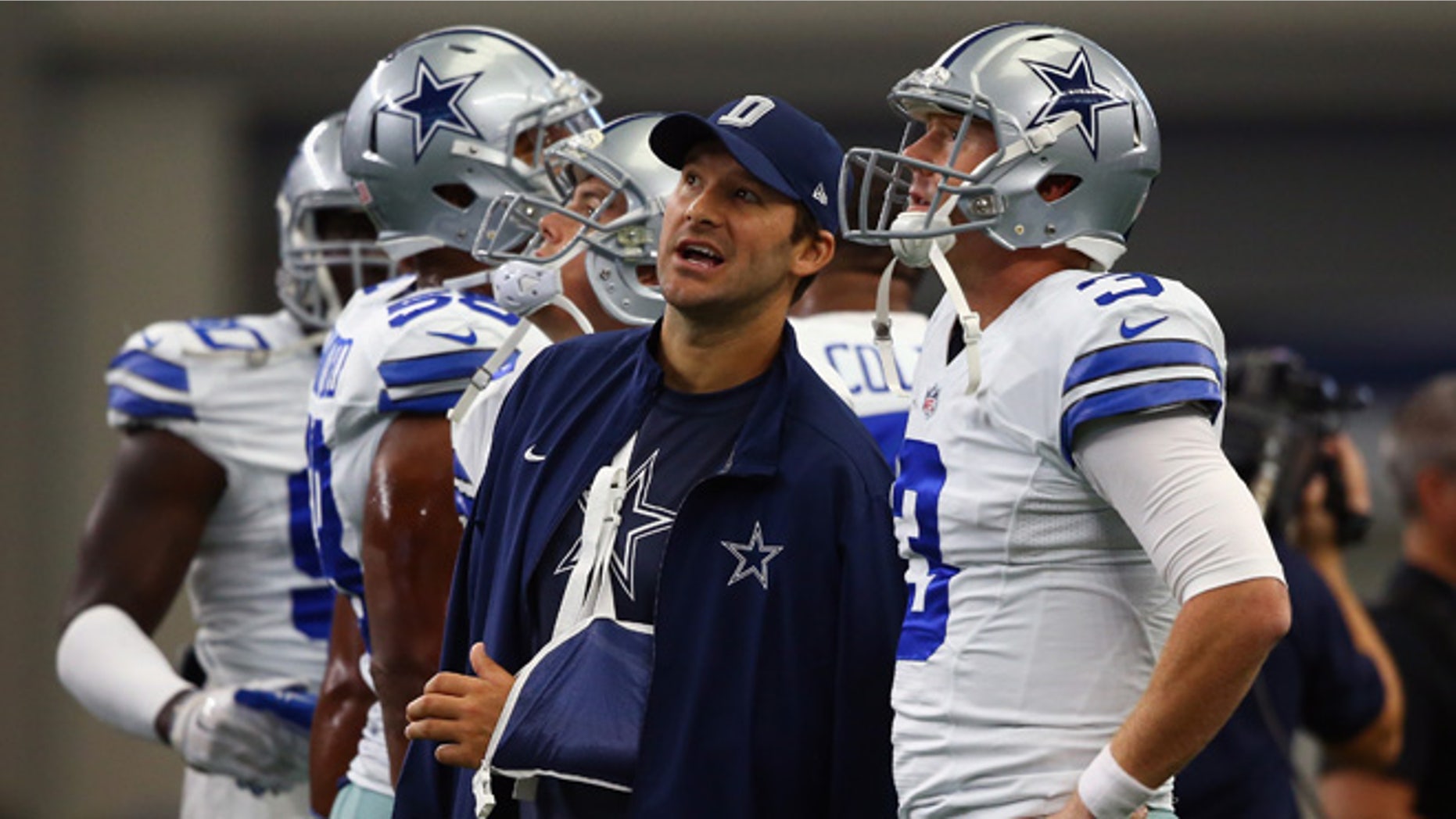 ARLINGTON, TX - SEPTEMBER 27: (L-R) Tony Romo #9 of the Dallas Cowboys talks with Brandon Weeden #3 before a game against the Atlanta Falcons at AT&T Stadium on September 27, 2015 in Arlington, Texas. (Photo by Ronald Martinez/Getty Images)