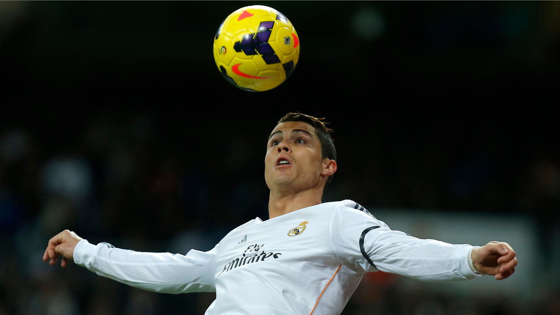 Ronaldo controls the ball during a soccer match between Real Madrid and Celta Vigo in Madrid, Spain, Jan. 6, 2014.