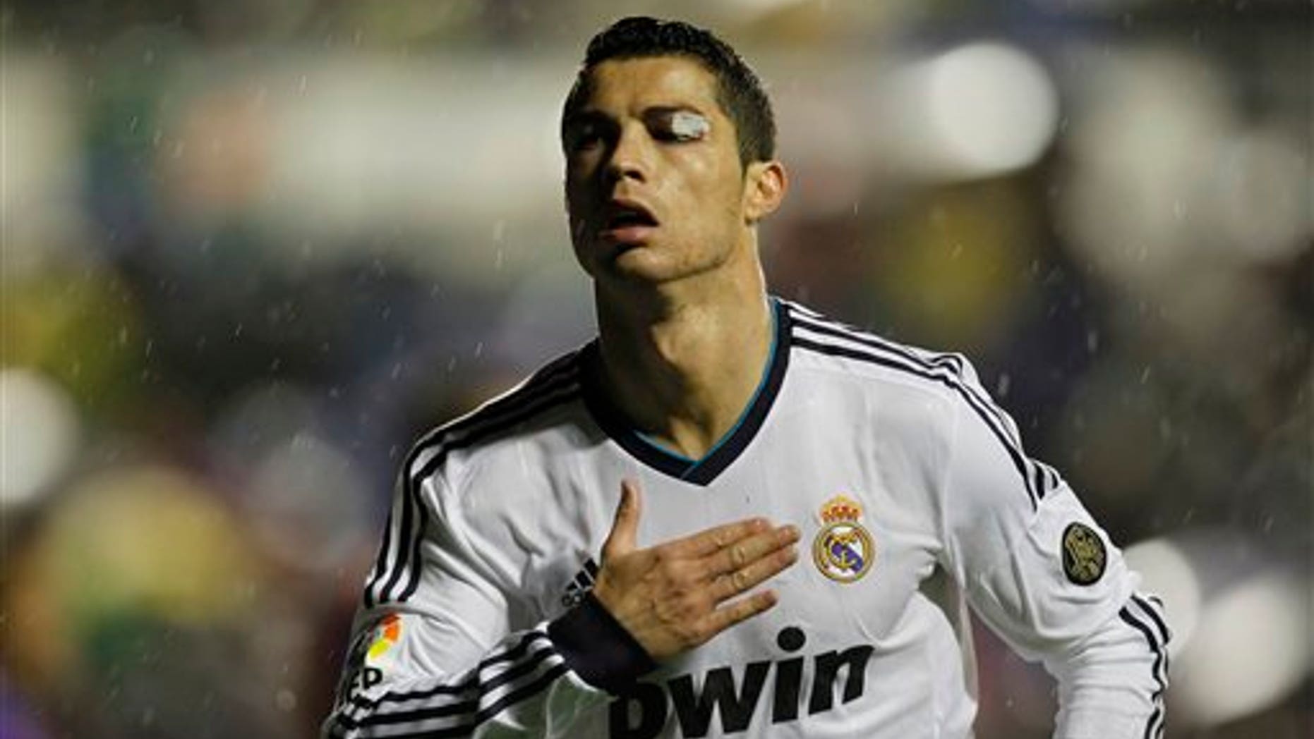 Cristiano Ronaldo's left eye was cut by David Navarro during Real Madrid's match against Levante on Nov. 11, 2012. (AP Photo/ Fernando Hernández)