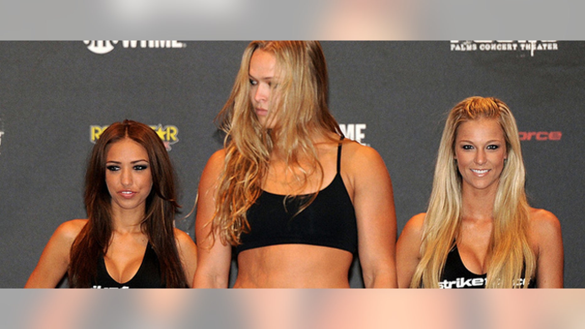 Ronda Rousey, shown here at a weigh-in at Palms Hotel and Casino in Las Vegas, is the sport's most recognizable female fight. (AP)
