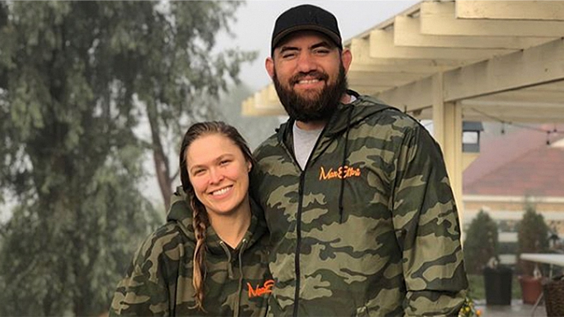 Ronda Rousey, left, and Travis Browne married in August 2017.