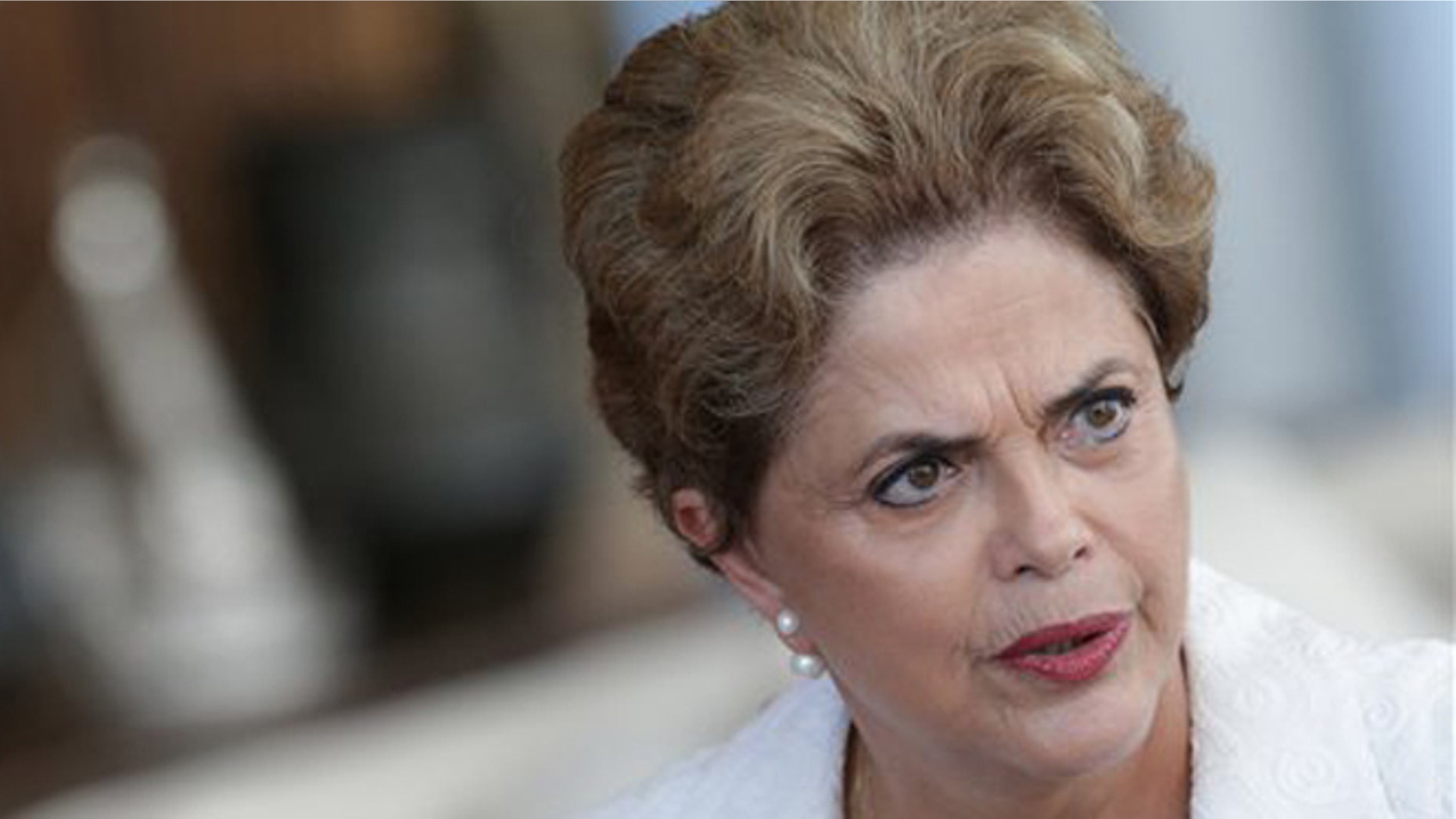 FILE - In this May 13, 2016, file photo, suspended Brazilian President Dilma Rousseff speaks during a press conference with the international press corps, at the presidential residence Alvorada Palace in Brasilia, Brazil. Rousseff was quoted in an interview published on Sunday, May 29, 2016, that her impeachment is aimed at stopping the current corruption investigation against several politicians and businessmen. (AP Photo/Eraldo Peres, File)
