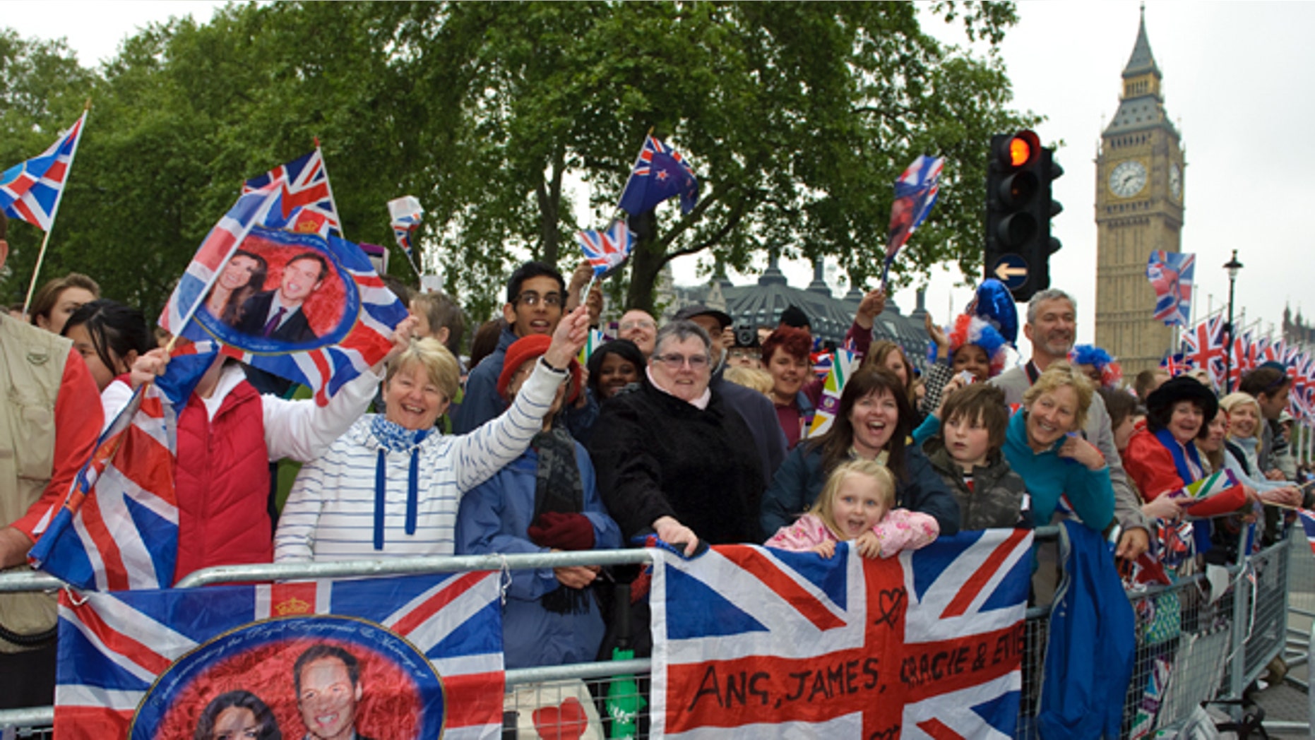 April 29: Enthusiastic crowds await the Royal Wedding in Parliament Square, London.