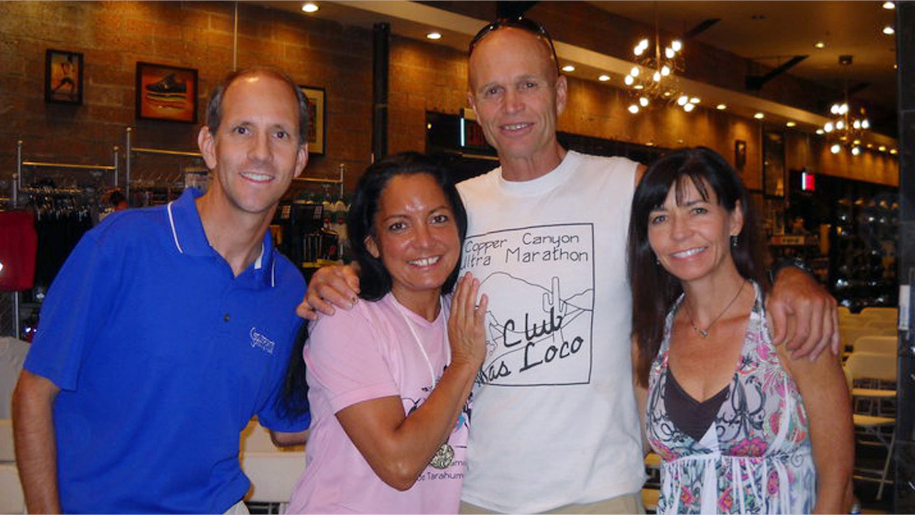 This June 25, 2010, photo provided by Sole Sports Running Zone, shows, from left, Lance Muzslay, Maria Walton, Micah True and Karen Pitre Seymour in Tempe, Ariz. Organizers of a photography exhibit in Philadelphia say it has taken on new poignancy after the unexpected death of one of its subjects. The installation at the University of Pennsylvania museum is now dedicated to the memory of extreme runner Micah True. (AP Photo/Sole Sports Running Zone)