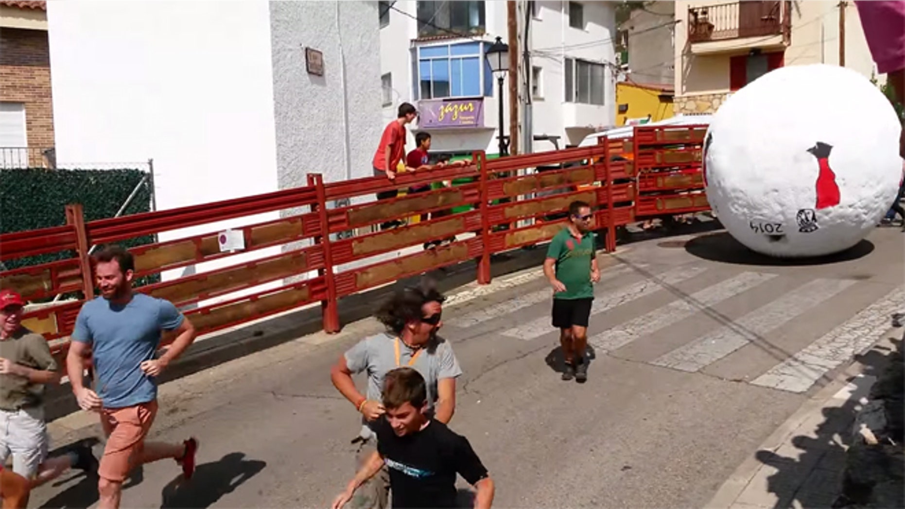 The Running of the Balls in Mataelpino, Spain. (Photo: Via YouTube)