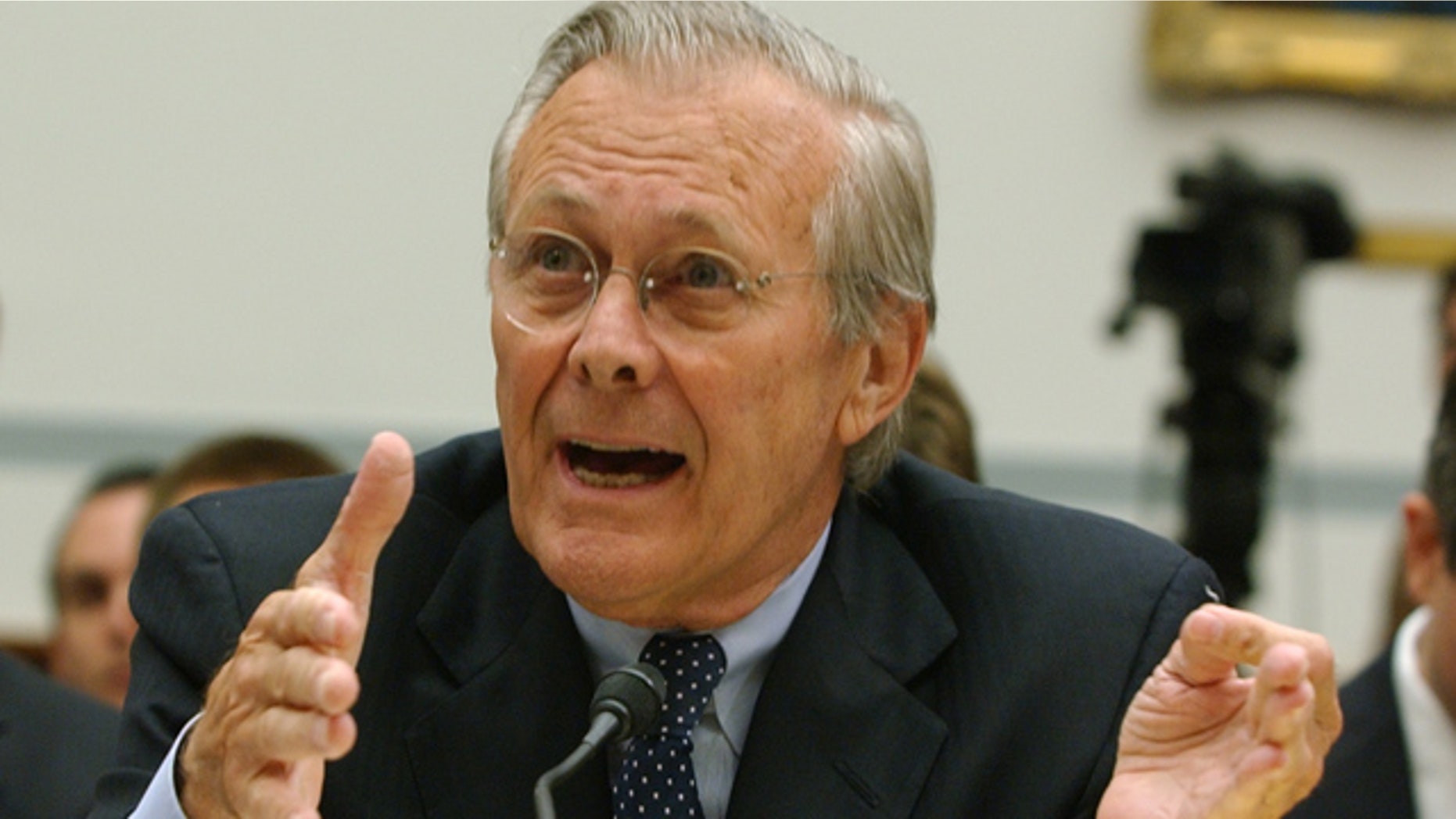 FILE: Former Defense Secretary Donald Rumsfeld testifies on Capitol Hill in Washington.