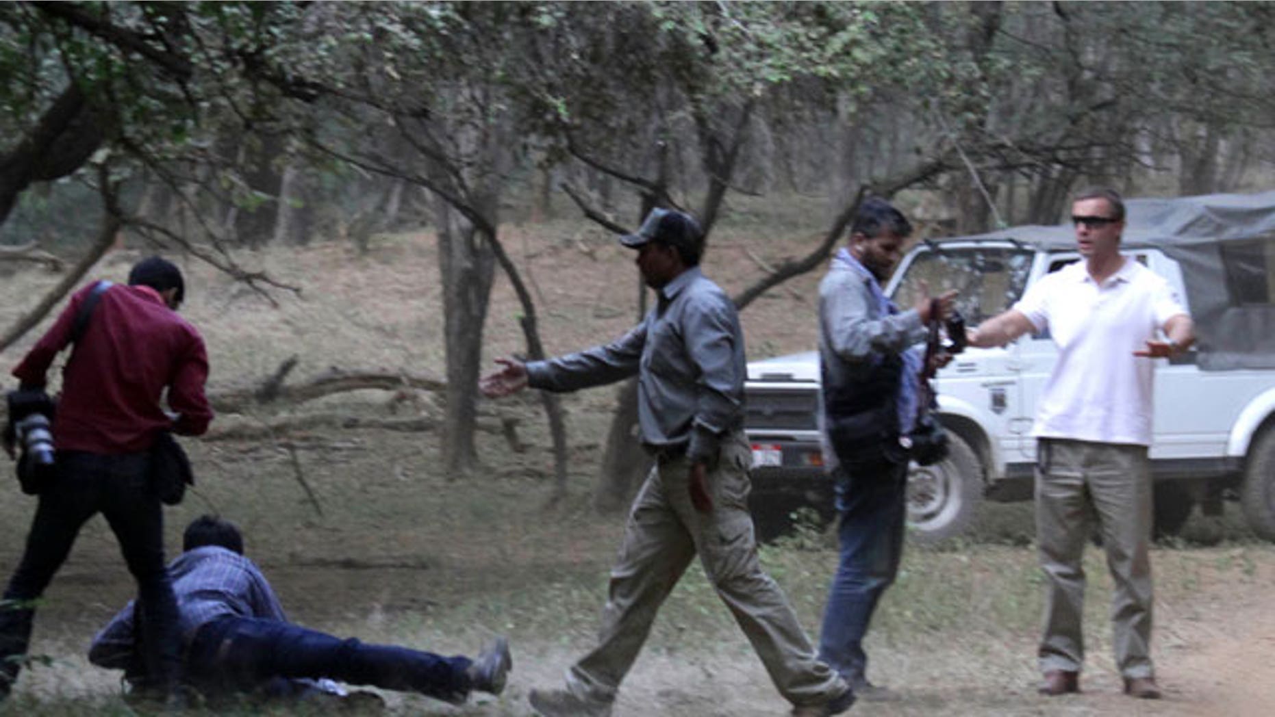Oct. 22: An AP photographer captured images of an altercation between Brand's entourage and photographers in India.
