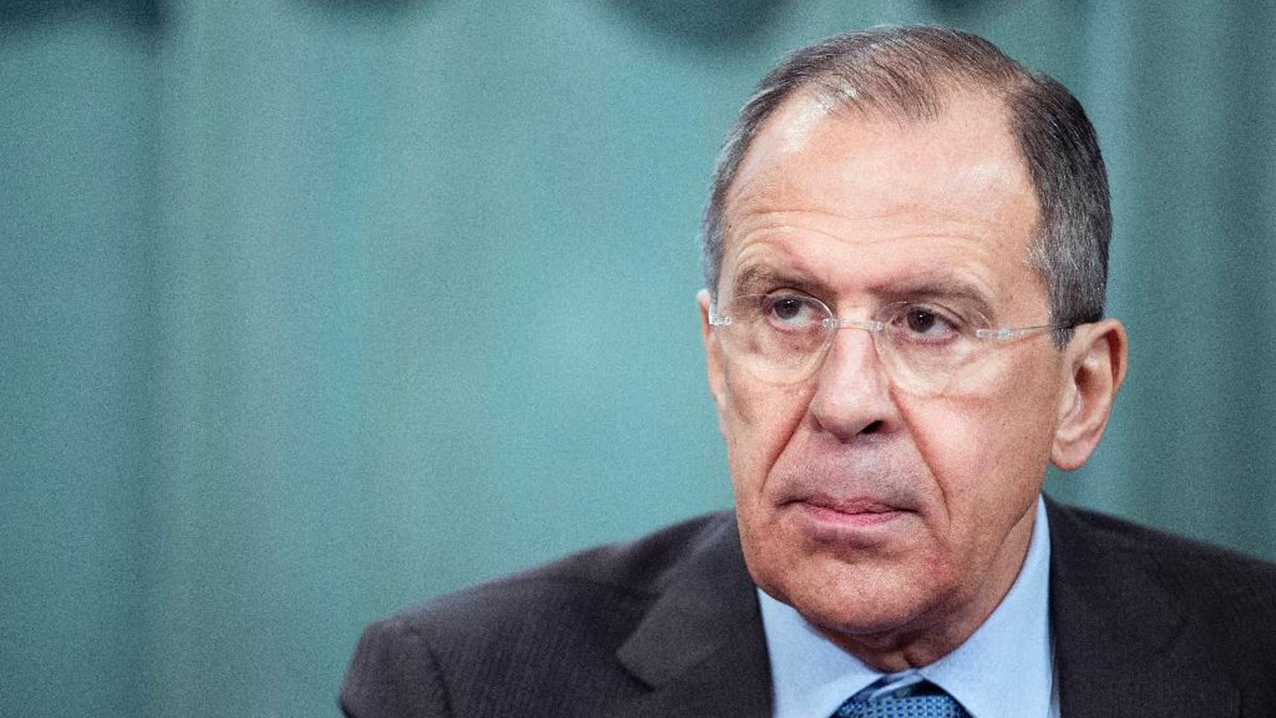 Russian Foreign Minister Sergey Lavrov attends a news conference after meeting with Foreign Ministers of the Commonwealth of Independent States (CIS) in Moscow, Russia, Friday, April 4, 2014. Russia had no connection to the snipers in Ukraine and could not have any relation, said Russian Foreign Minister Sergey Lavrov on Friday in Moscow after the meeting with Foreign Ministers of the CIS. (AP Photo/Ivan Sekretarev)