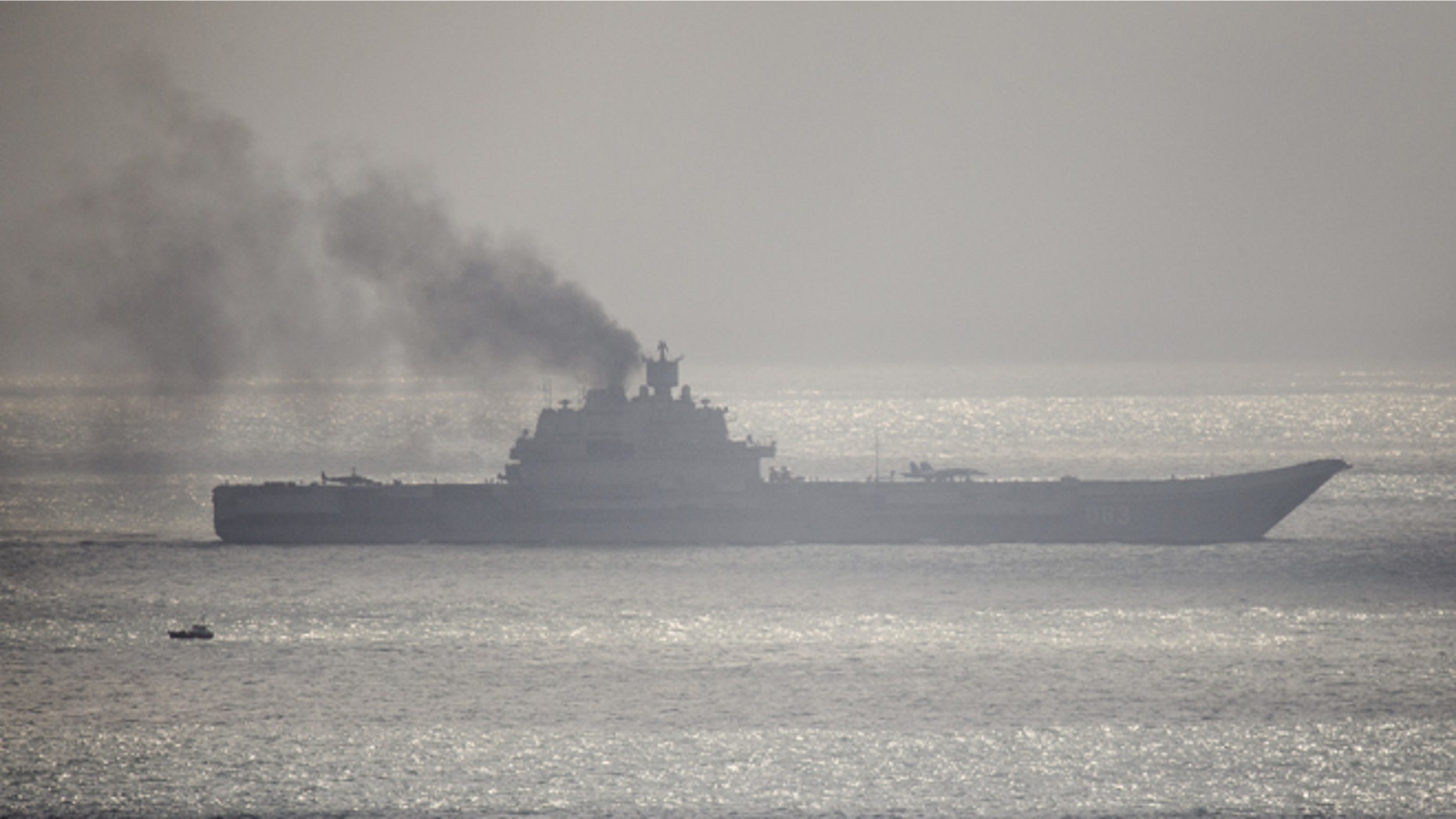 DOVER, ENGLAND - OCTOBER 21: The Russian aircraft carrier Admiral Kuznetsov passes through the English channel on October 21, 2016 near Dover, England. The Russian Navy's flotilla of warships is presumed to be heading to the eastern Mediterranean to support the Russian military's current deployment in Syria. (Photo by Leon Neal/Getty Images)