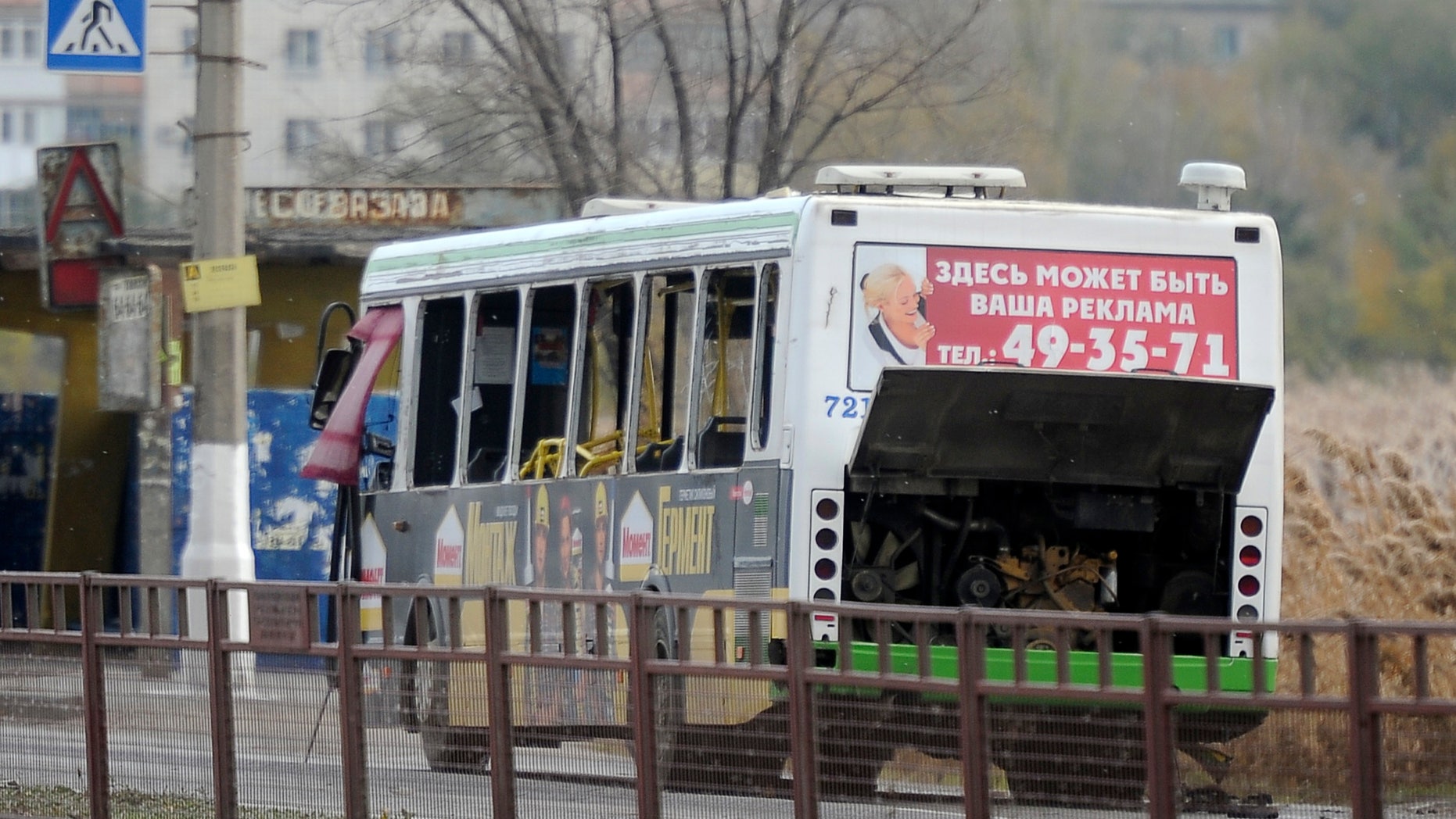 Oct. 21, 2013 - A damaged bus is examined by experts in Volgograd. The blast was caused by an unspecified explosive device, the National Anti-Terrorism Committee said in a statement. At least five died and 32 were injured.