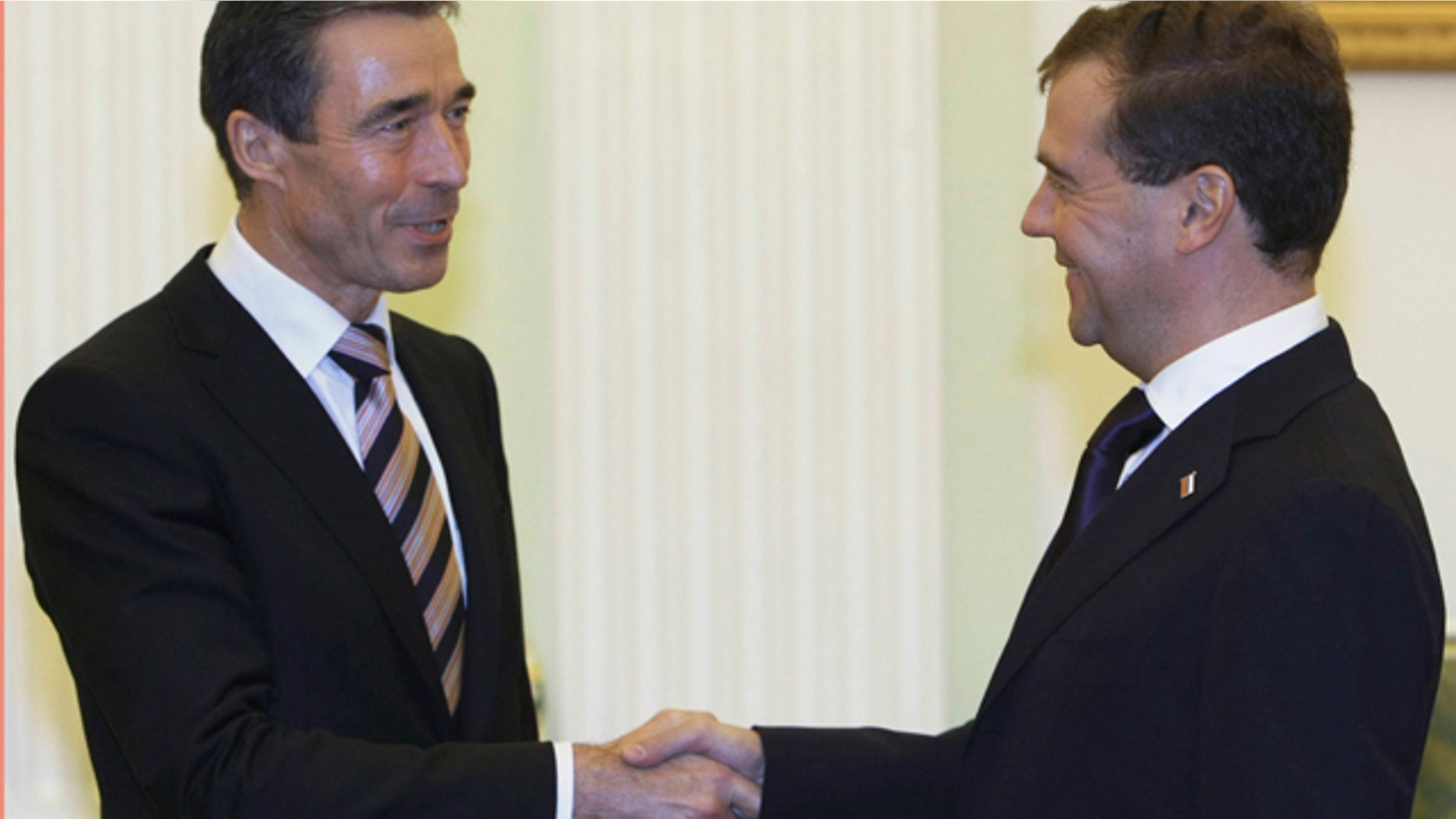 Nov. 3, 2010: Russian President Dmitry Medvedev, right, shakes hands with NATO Chief Anders Fogh Rasmussen during their meeting in the Kremlin in Moscow, Russia.