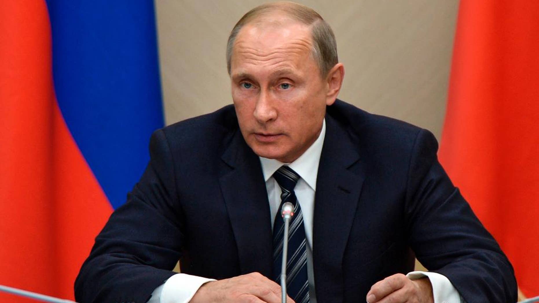 Sept. 30, 2015: Russian President Vladimir Putin holds a meeting with senior government officials at the Novo-Ogaryovo residence outside Moscow, Russia.