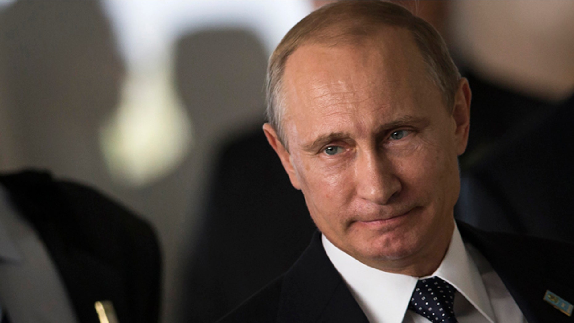 July 16, 2014: Russia's President Vladimir Putin arrives for an official group photo during the BRICS summit at the Itamaraty palace, in Brasilia, Brazil. (AP Photo/Felipe Dana, File )