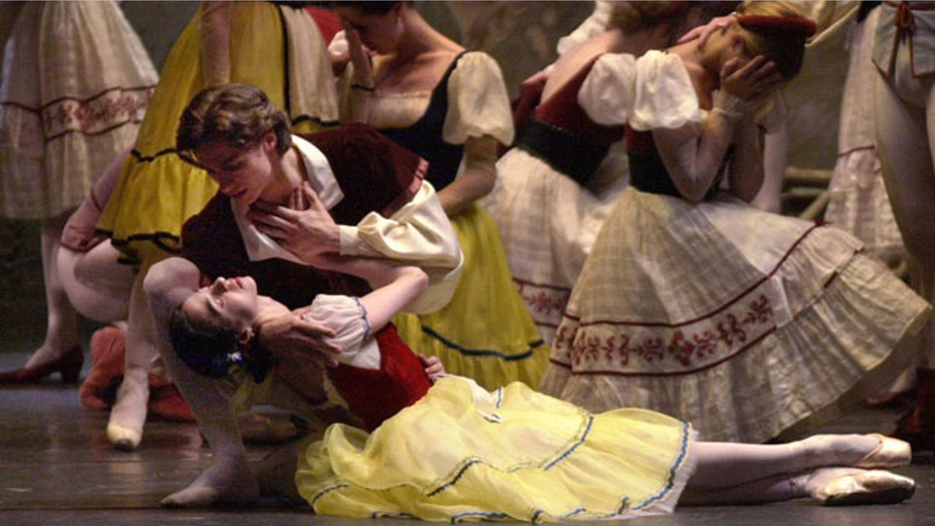 Sergei Filin as Albrecht and Nina Ananiashvili as Giselle perform a tragic scene during a dress rehearsal of the Bolshoi Ballet's United States premiere of "Giselle" at The Lincoln Center for the Performing Arts, in New York.