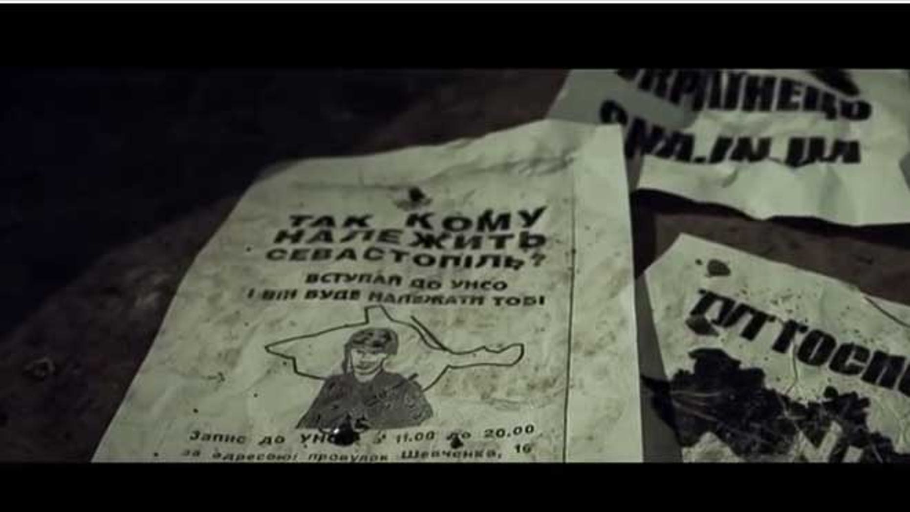 The YouTube video shows leaflets depicting a takeover of Russia by right-wing Ukrainian extremists.