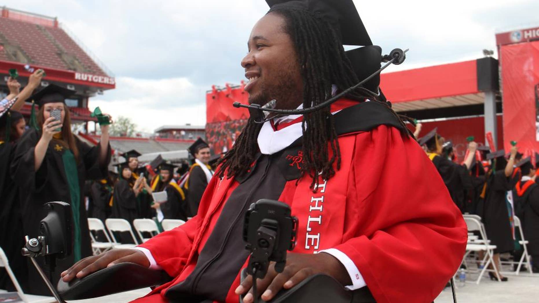 Paralyzed Rutgers football player LeGrand tells fellow grads that