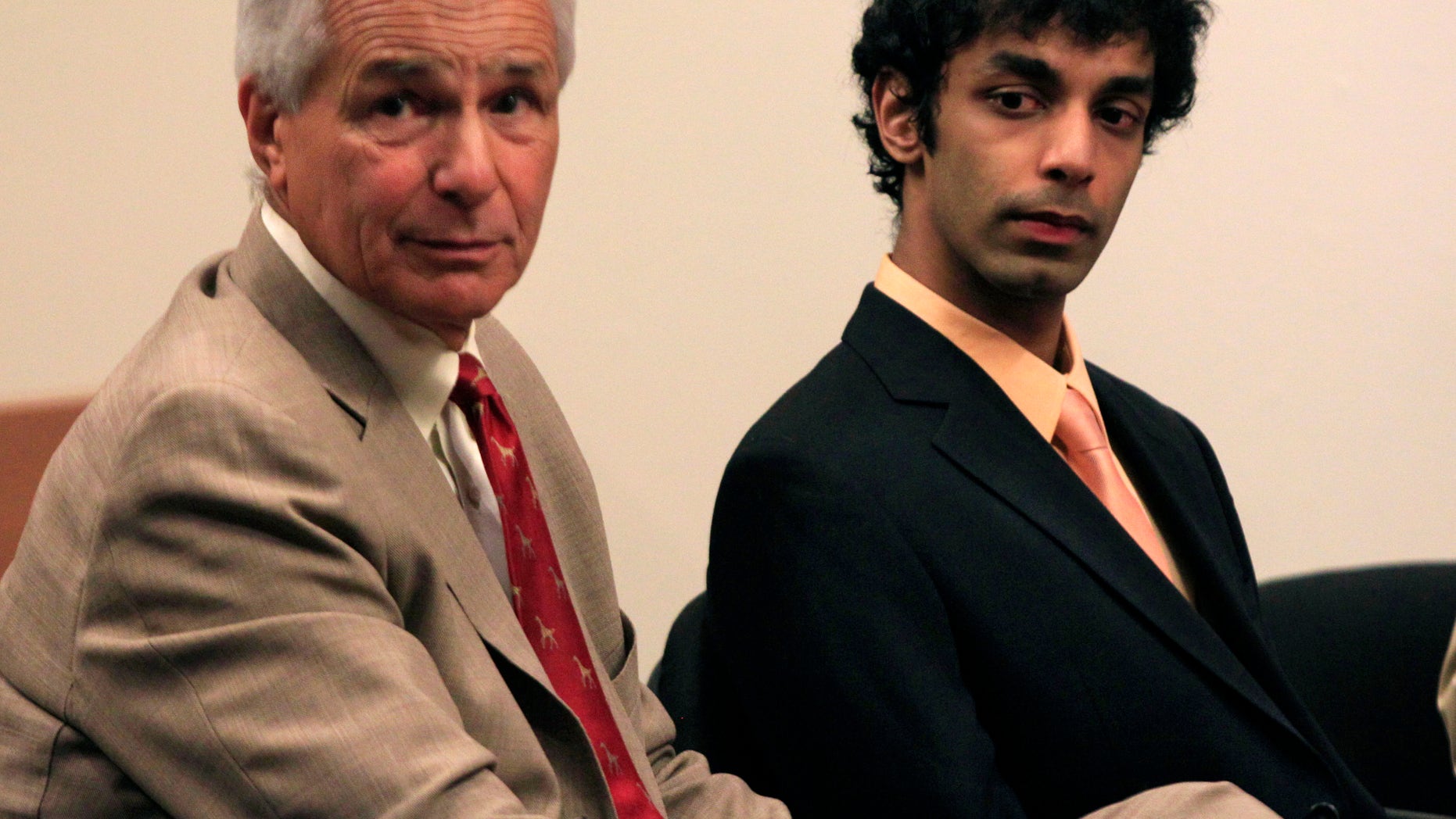 May 30: Dharun Ravi, right, sits with his attorney Joseph Benedict during a hearing in New Brunswick, N.J.