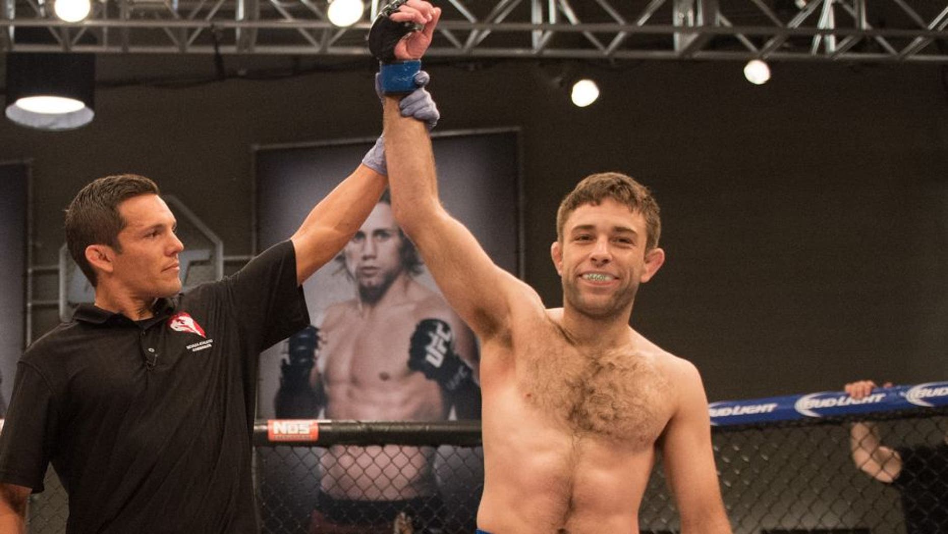 LAS VEGAS, NV - JULY 24: (R-L) Ryan Hall celebrates his submission victory over Frantz Slioa during the filming of The Ultimate Fighter: Team McGregor vs Team Faber at the UFC TUF Gym on July 24, 2015 in Las Vegas, Nevada. (Photo by Brandon Magnus/Zuffa LLC/Zuffa LLC via Getty Images)