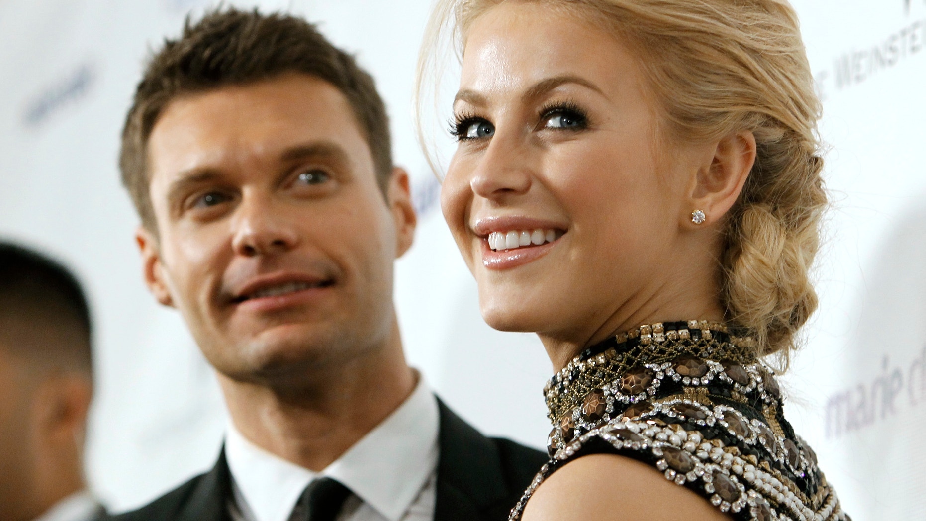 Ryan Seacrest and Julianne Hough arrive at The Weinstein Company and Relativity Media's after party for the 68th annual Golden Globe Awards in Beverly Hills, California January 16, 2011.