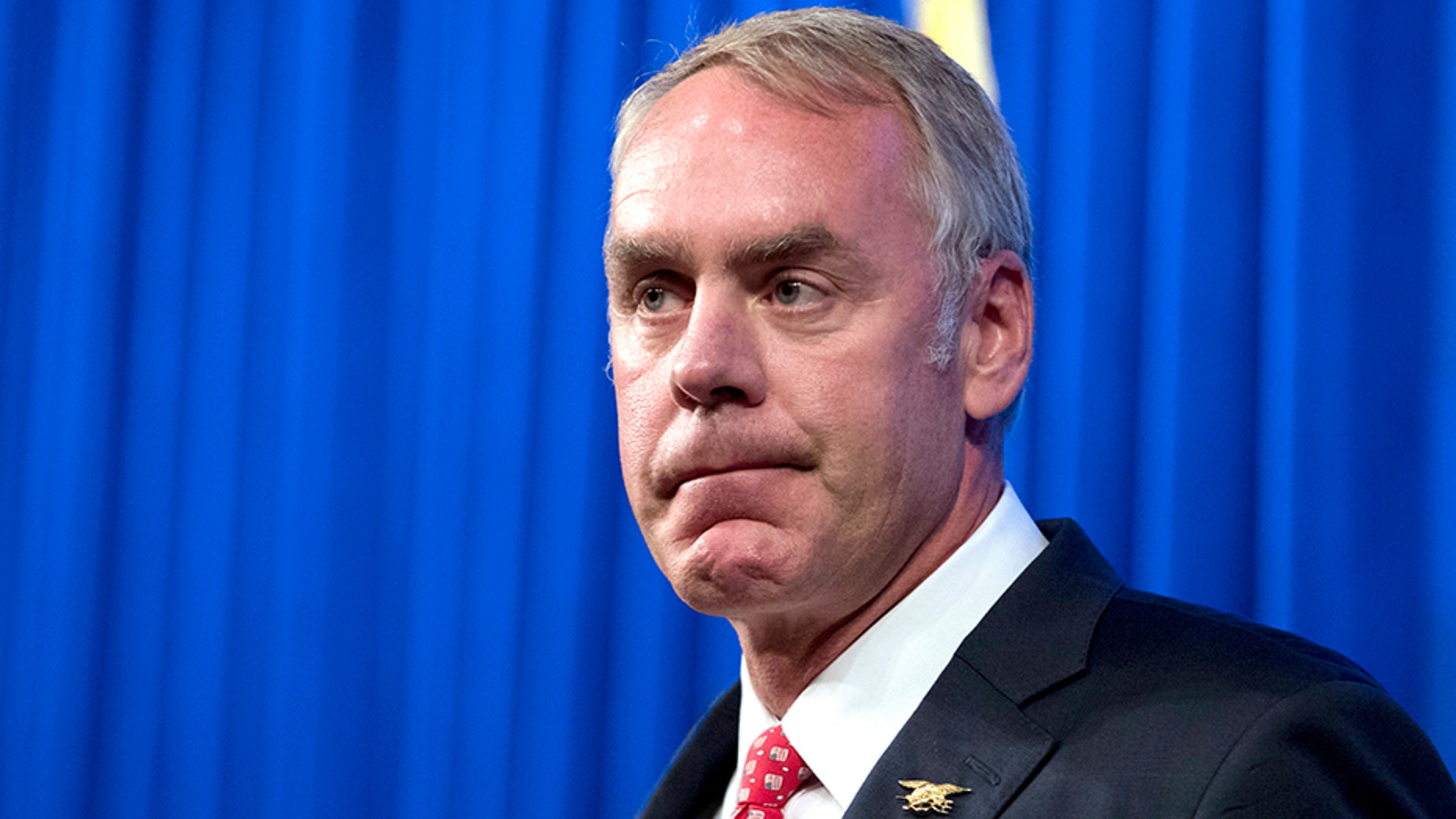 FILE - In this Sept. 29, 2017, file photo, Interior Secretary Ryan Zinke speaks about the Trump Administration's energy policy at the Heritage Foundation in Washington.