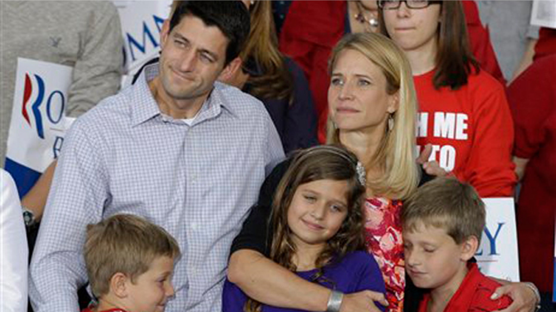 Sunday, August, 12, 2012: GOP Vice presidential candidate Rep. Paul Ryan, R-Wis, with wife Janna, daughter Liza and sons Charles, and Sam, right, during a rally in Waukesha, Wis.