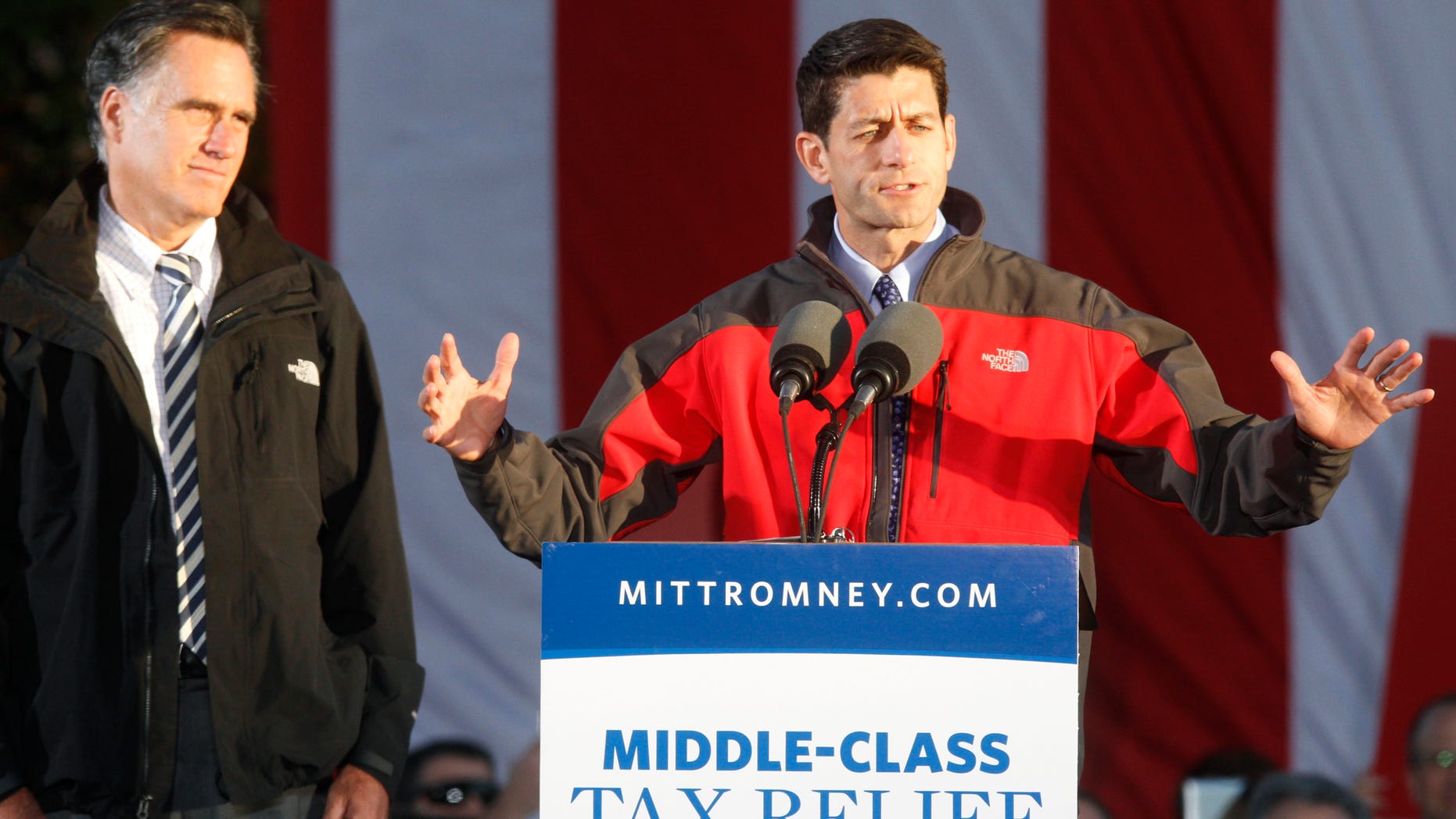 Friday, Oct. 12, 2012: Republican vice presidential candidate Rep. Paul Ryan, R-Wis., speaks as Mitt Romney listens during a rally in Lancaster, Ohio.