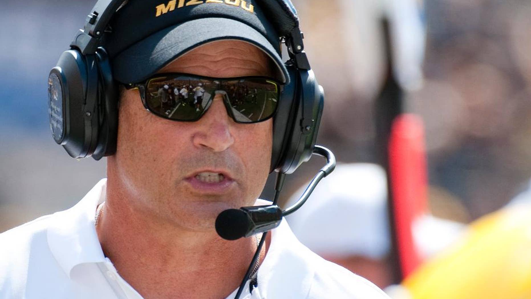 Missouri head coach Gary Pinkel talks to an official during the first quarter of an NCAA college football game against South Dakota State Saturday, Aug. 30, 2014, in Columbia, Mo. (AP Photo/L.G. Patterson)