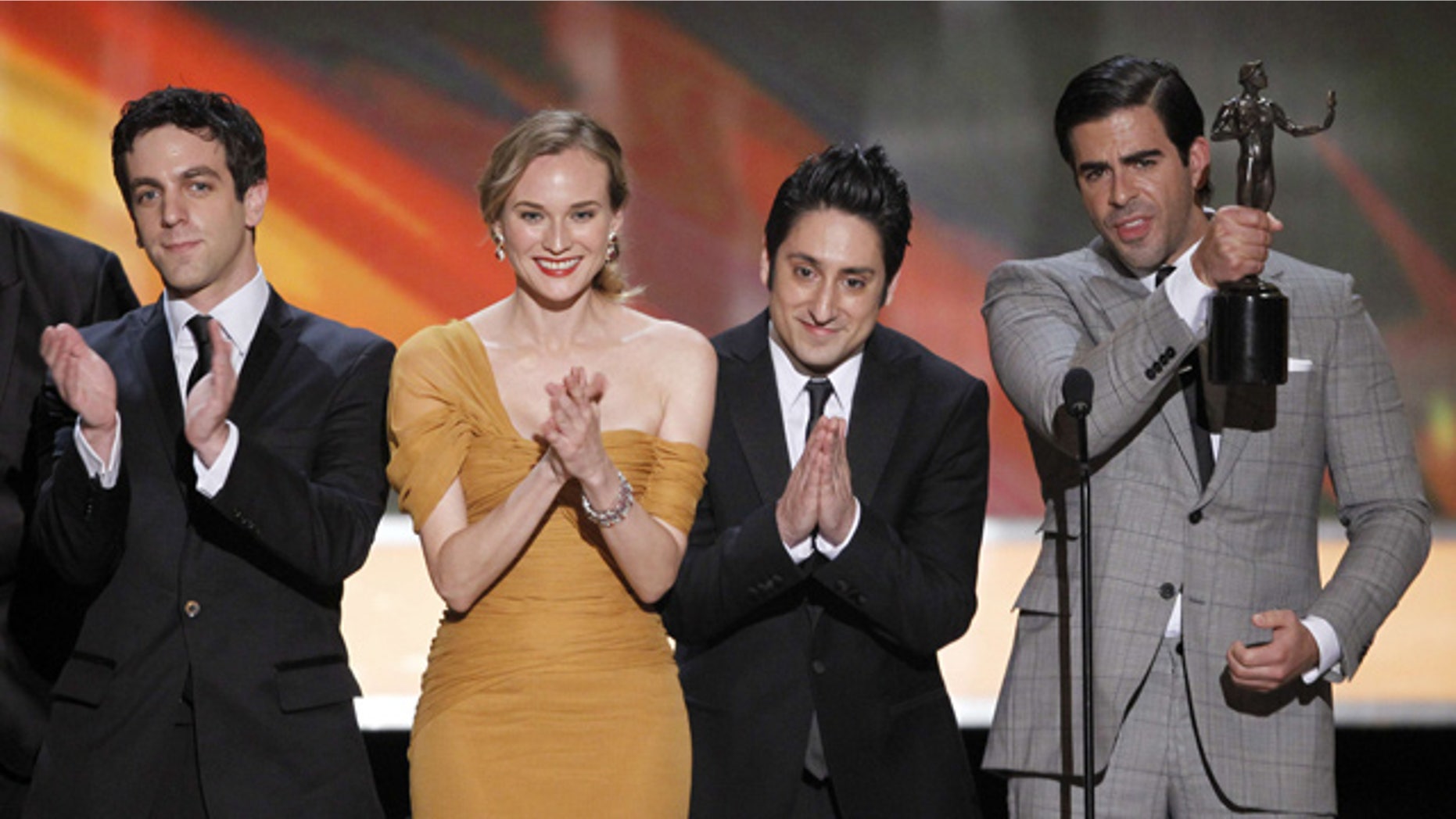 Jan. 23: B.J. Novak, Diane Kruger, Omar Doom and Eli Roth accept the award for best cast of a movie for "Inglourious Basterds." (AP)