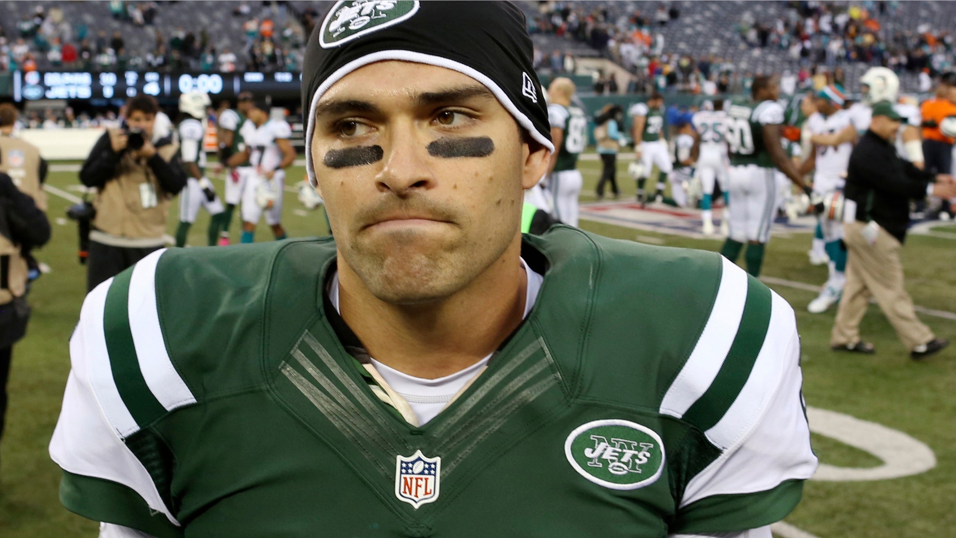 New York Jets quarterback Mark Sanchez (6) leaves the field after an NFL football game against the Miami Dolphins Sunday, Oct. 28, 2012 in East Rutherford, N.J. The Dolphins won the game 30-9. (AP Photo/John Minchillo)