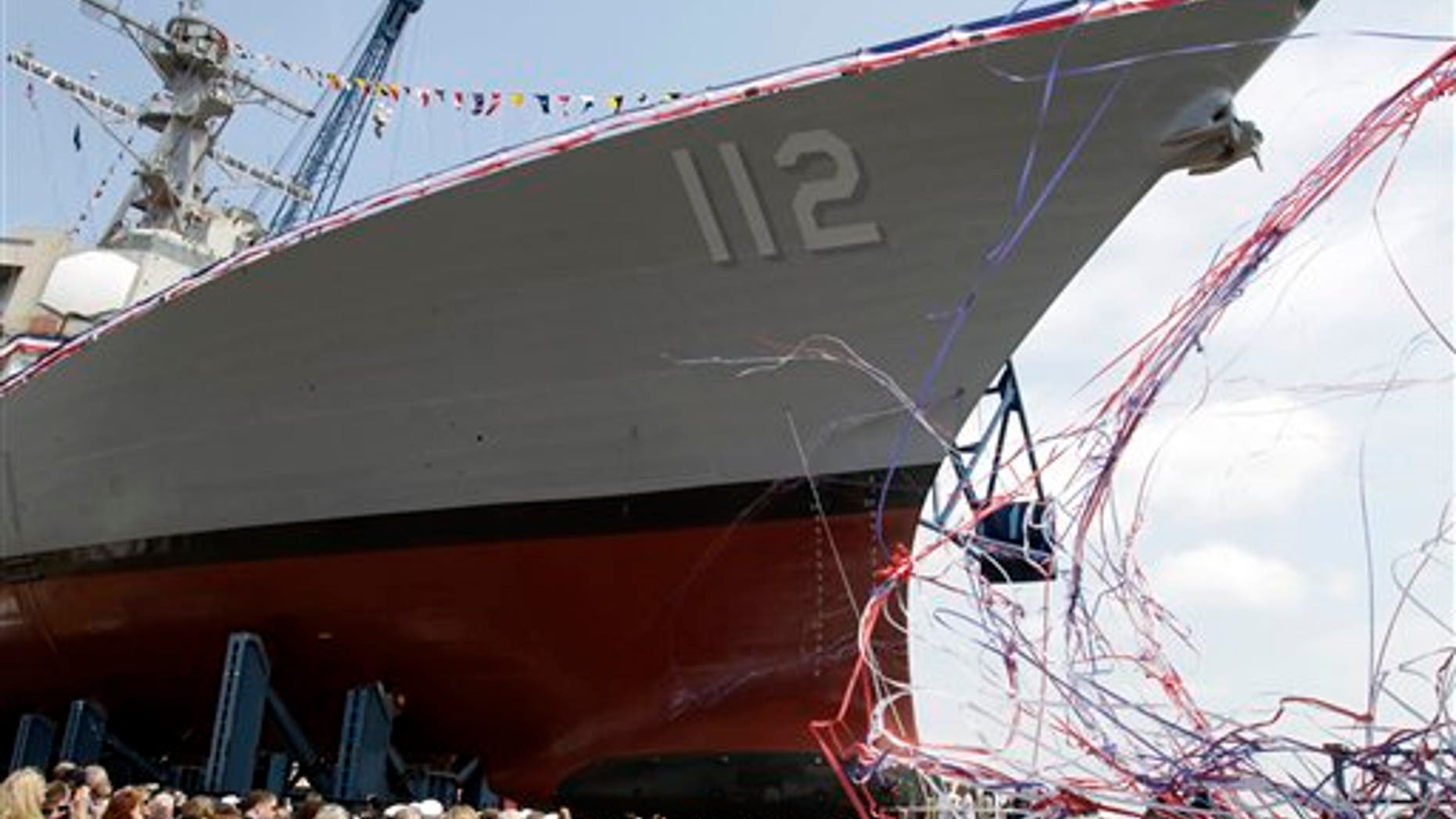 May 7: Hundreds watch during the ship christening ceremony at the Bath Iron Works shipyard honoring Medal of Honor recipient Navy Lt. Michael Murphy,in Bath, Maine. The destroyer under construction at Maine's Bath Iron Works bears the name of Lt. Michael Murphy, who was killed in a firefight on June 28, 2005, in eastern Afghanistan. The ceremony was held Saturday on what would've been Murphy's 35th birthday and nearly a week after Navy SEALs killed Usama bin Laden in Pakistan. (AP)