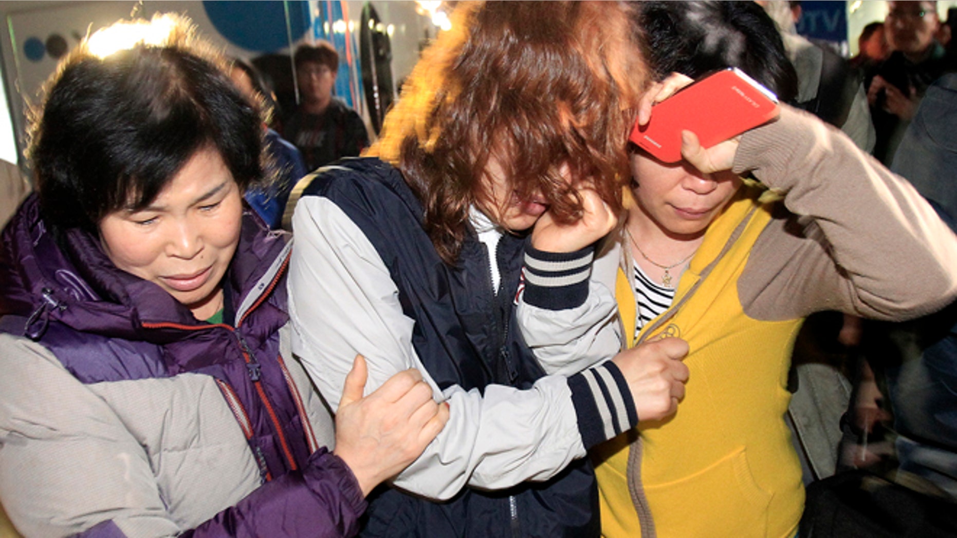 April 16: Relatives arrive to wait for missing people at a port in Jindo,South Korea.