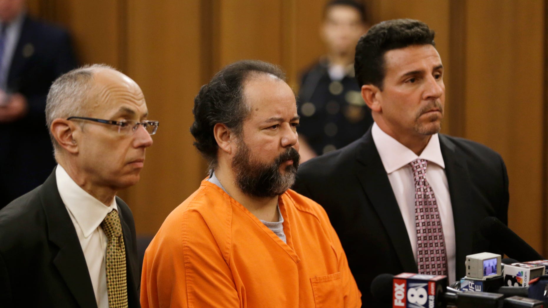 Ariel Castro with his defense attorneys during his arraignment Wednesday, July 17, 2013, in Cleveland.