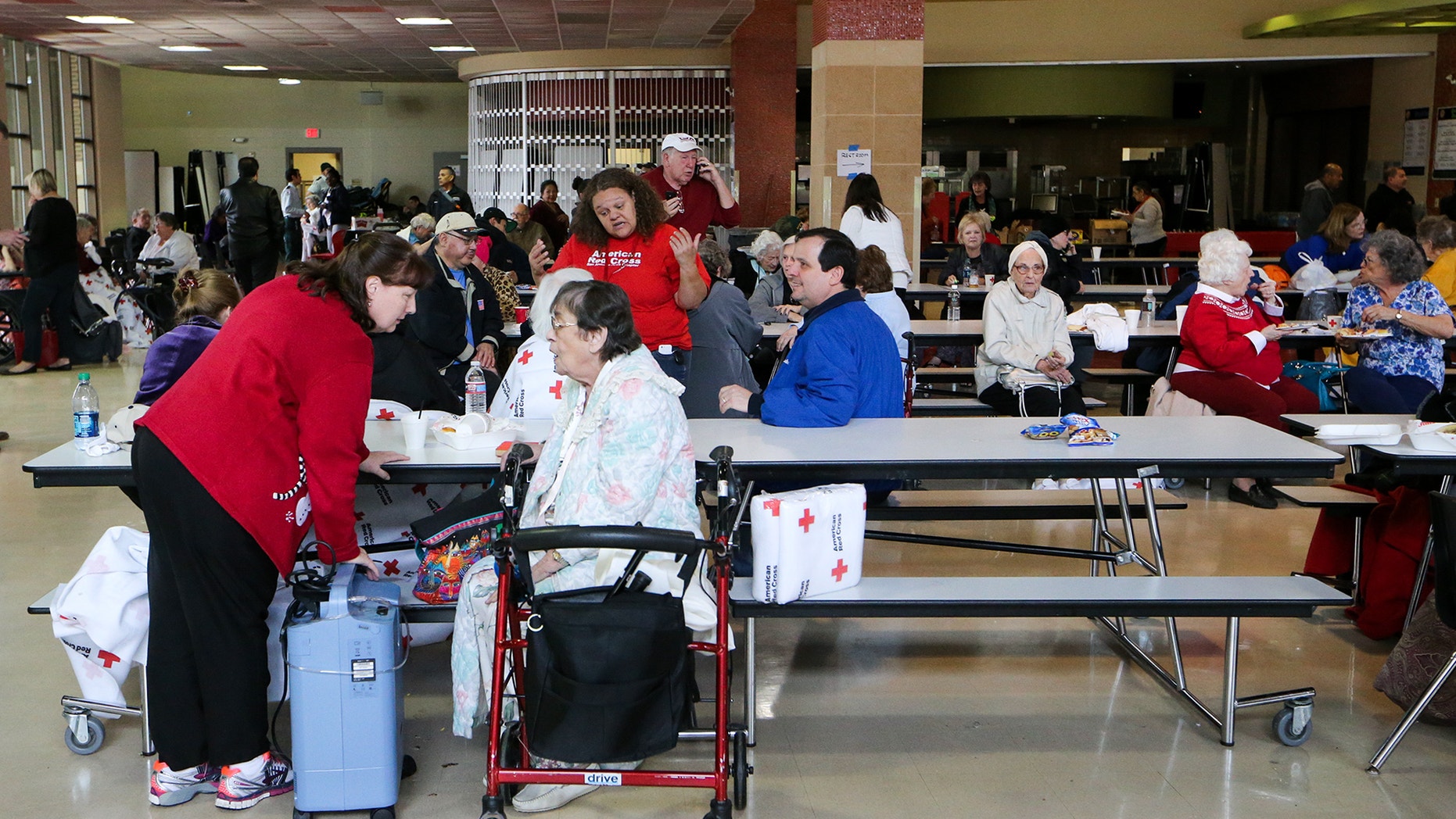 Dec. 28, 2014 - Seniors in a cafeteria at the Churchill School, a makeshift shelter after a fire at the senior-living Wedgwood Apartments in Castle Hills, a suburb of San Antonio Texas. 17 remained hospitalized and 5 residents were killed in the blaze.