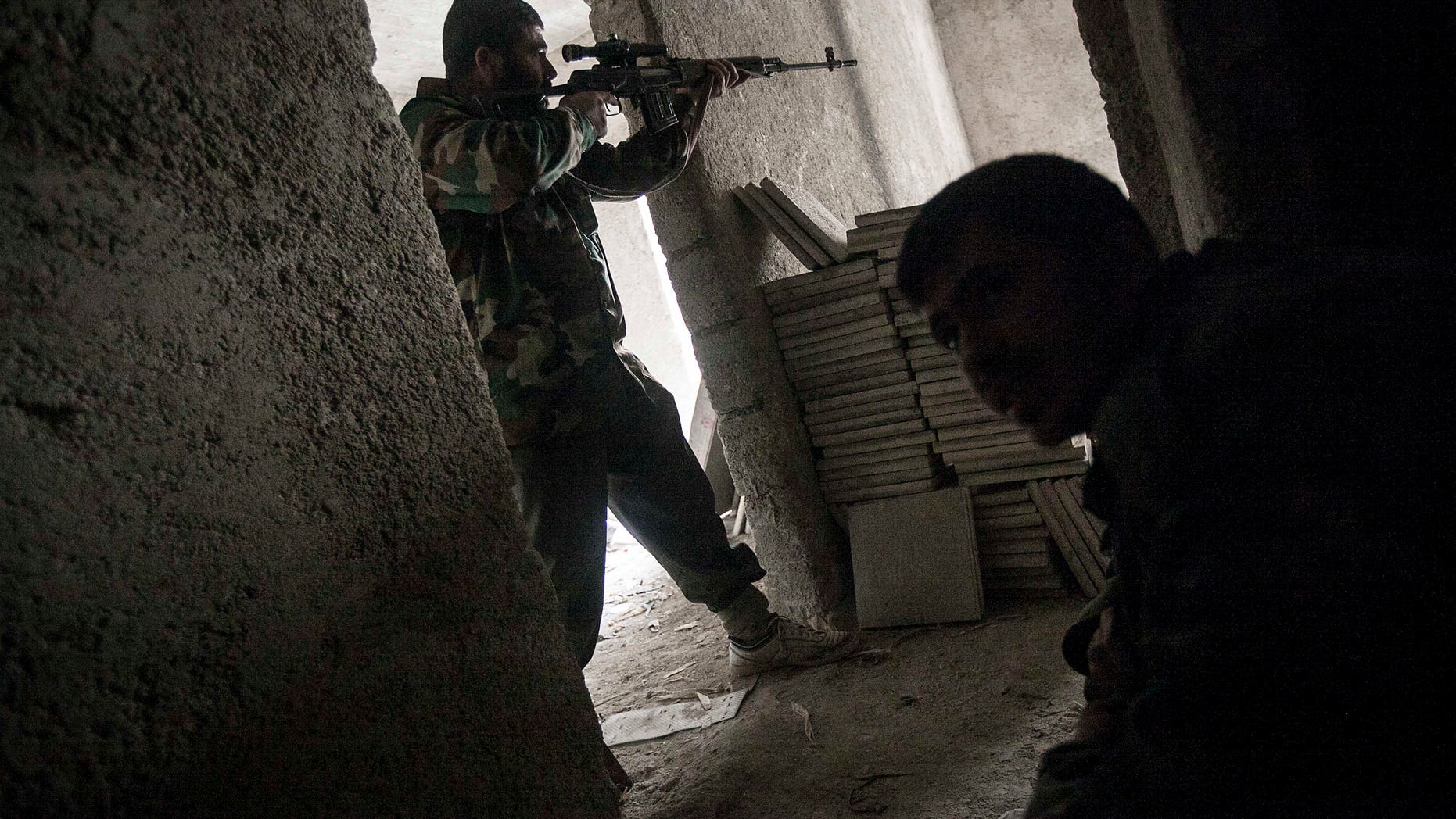 Dec 7, 2012 - Rebel fighter in Aleppo, Syria.